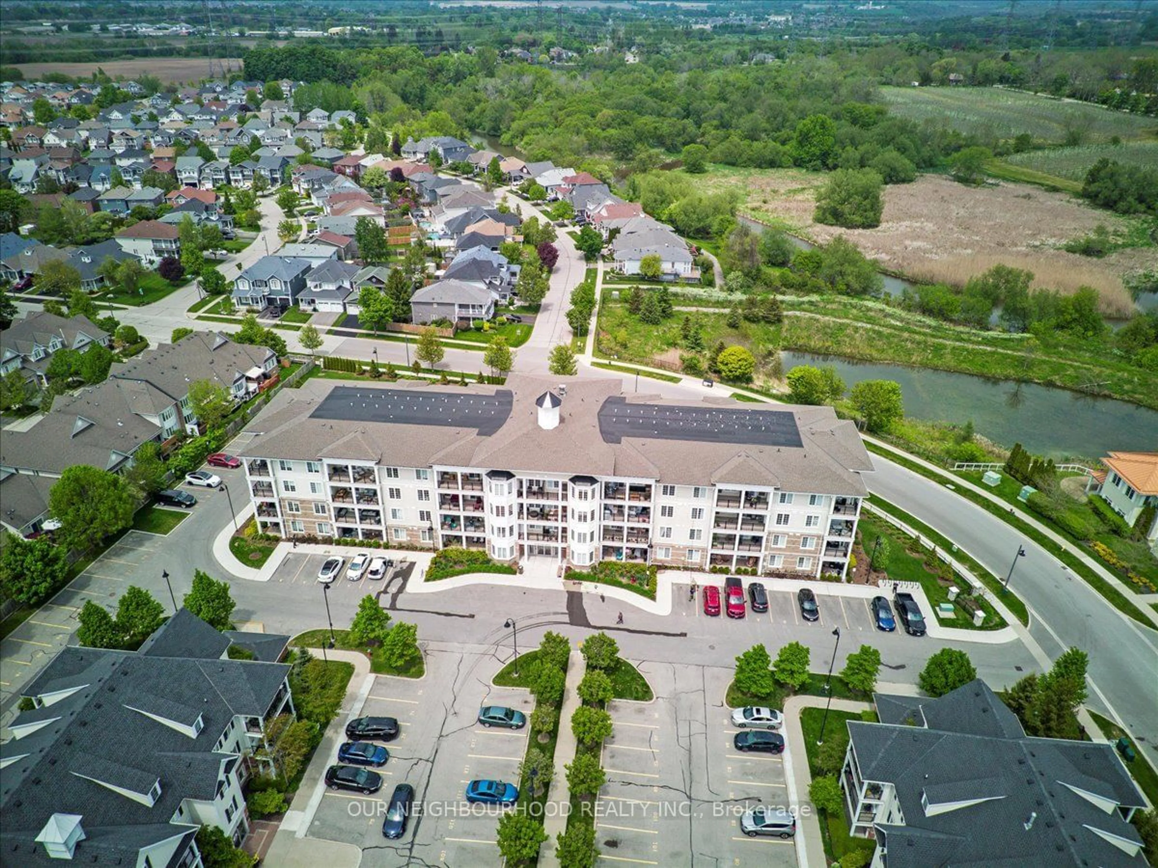 A pic from exterior of the house or condo, the street view for 65 Shipway Ave #312, Clarington Ontario L1B 0B7