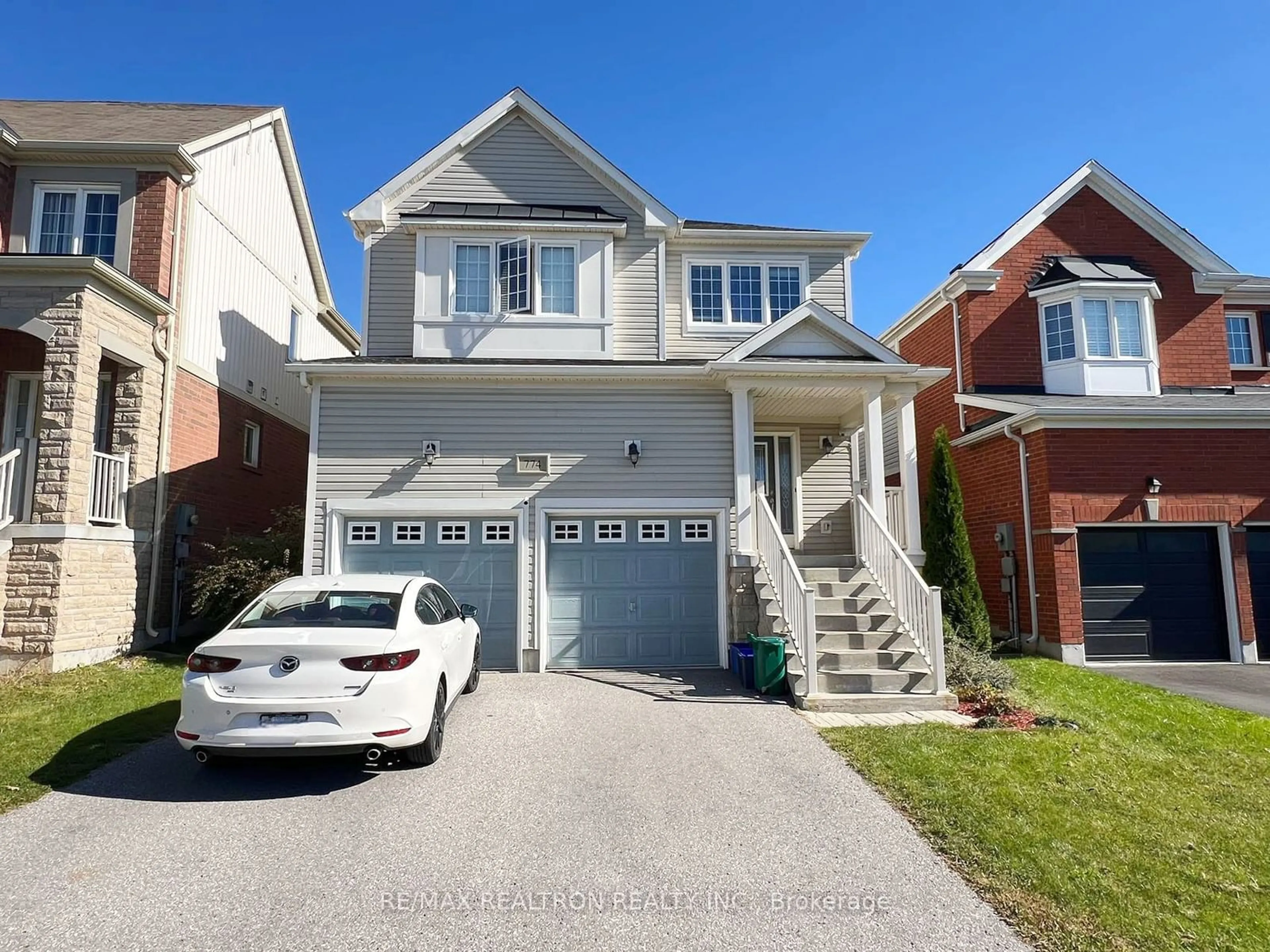 Frontside or backside of a home, the street view for 774 Mccue Dr, Oshawa Ontario L1K 0R1