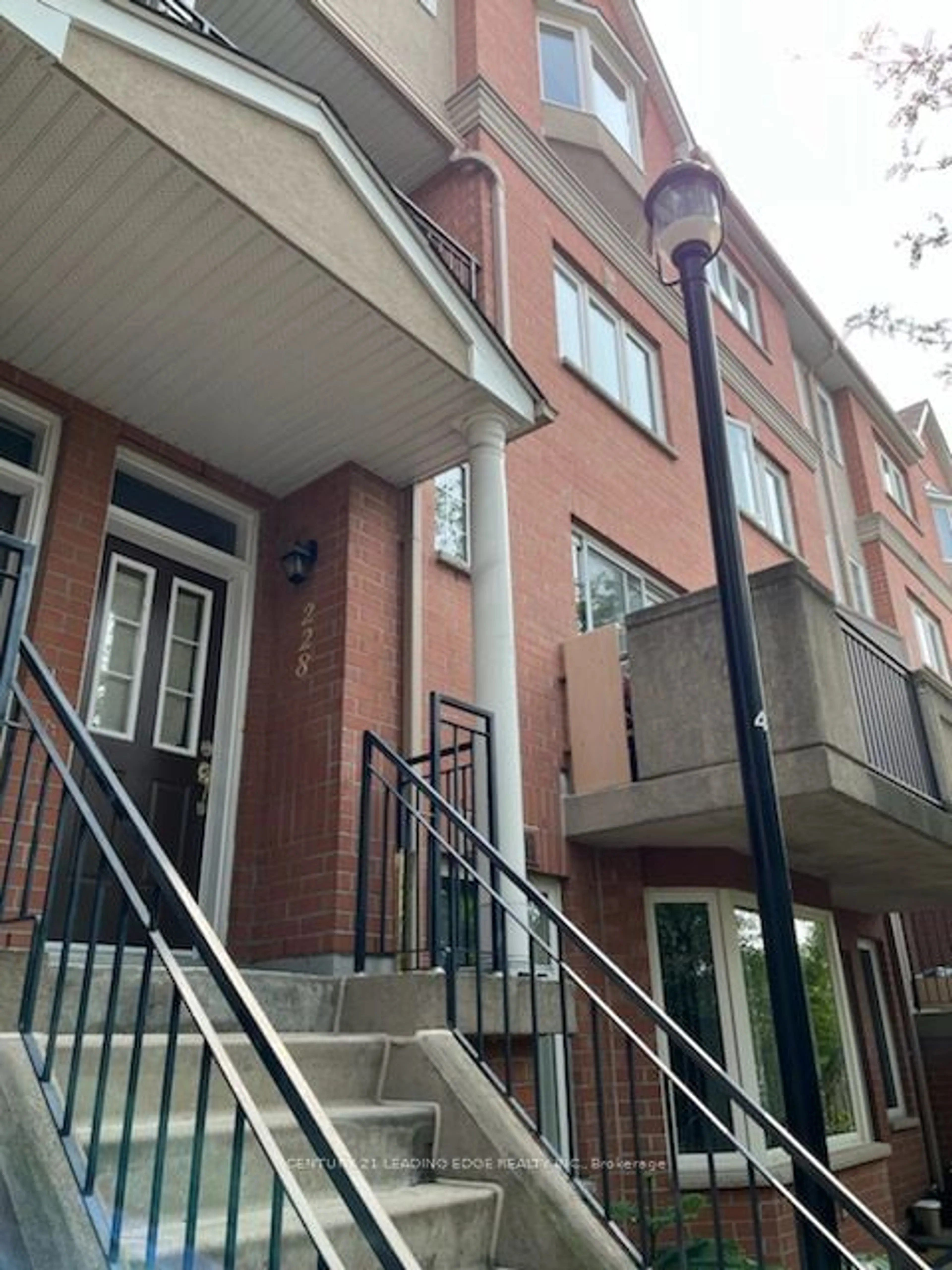 A pic from exterior of the house or condo, the front or back of building for 1881 Mcnicoll Ave #228, Toronto Ontario M1V 5M2