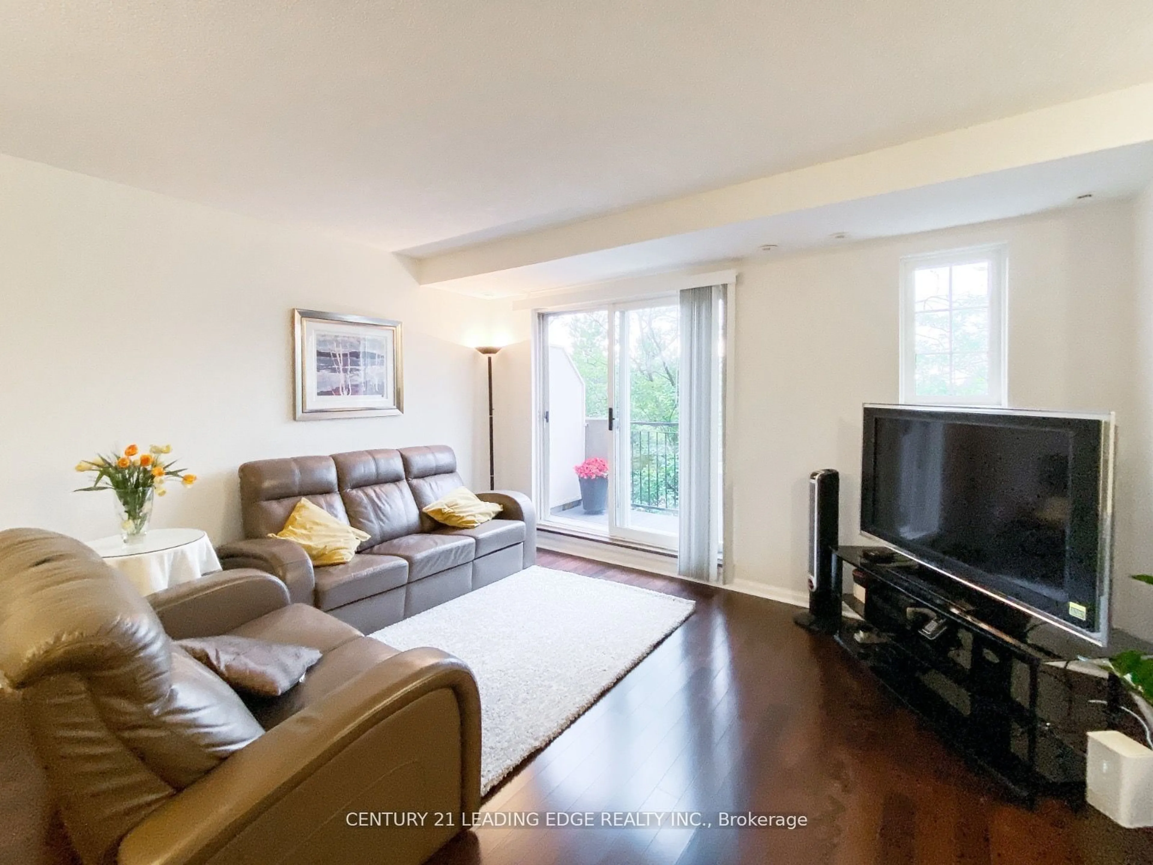 Living room, wood floors for 1881 Mcnicoll Ave #228, Toronto Ontario M1V 5M2