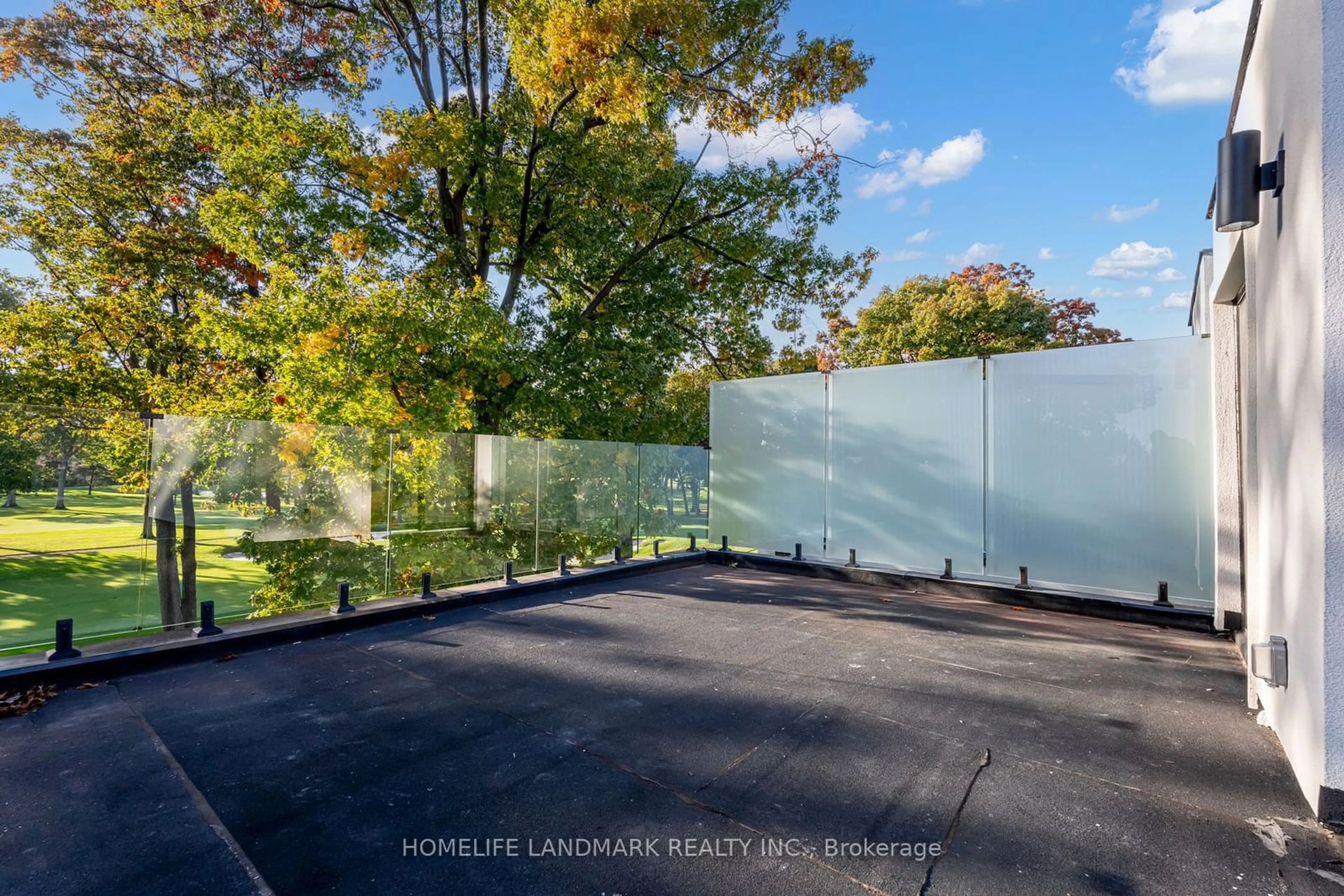 Frontside or backside of a home, the fenced backyard for 18 Haig Ave, Toronto Ontario M1N 2W1