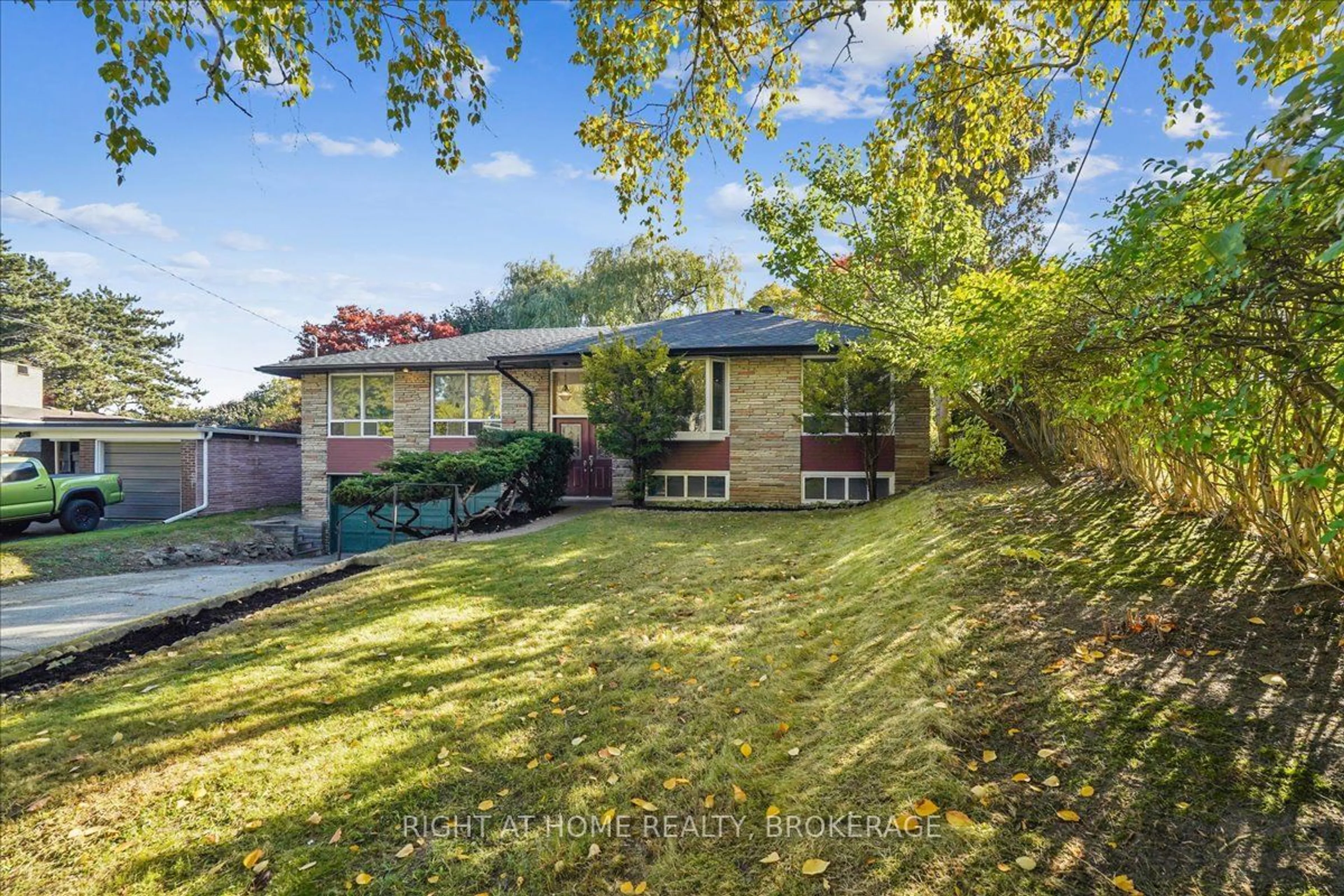 Frontside or backside of a home, the fenced backyard for 27 Bendale Blvd, Toronto Ontario M1J 2B1