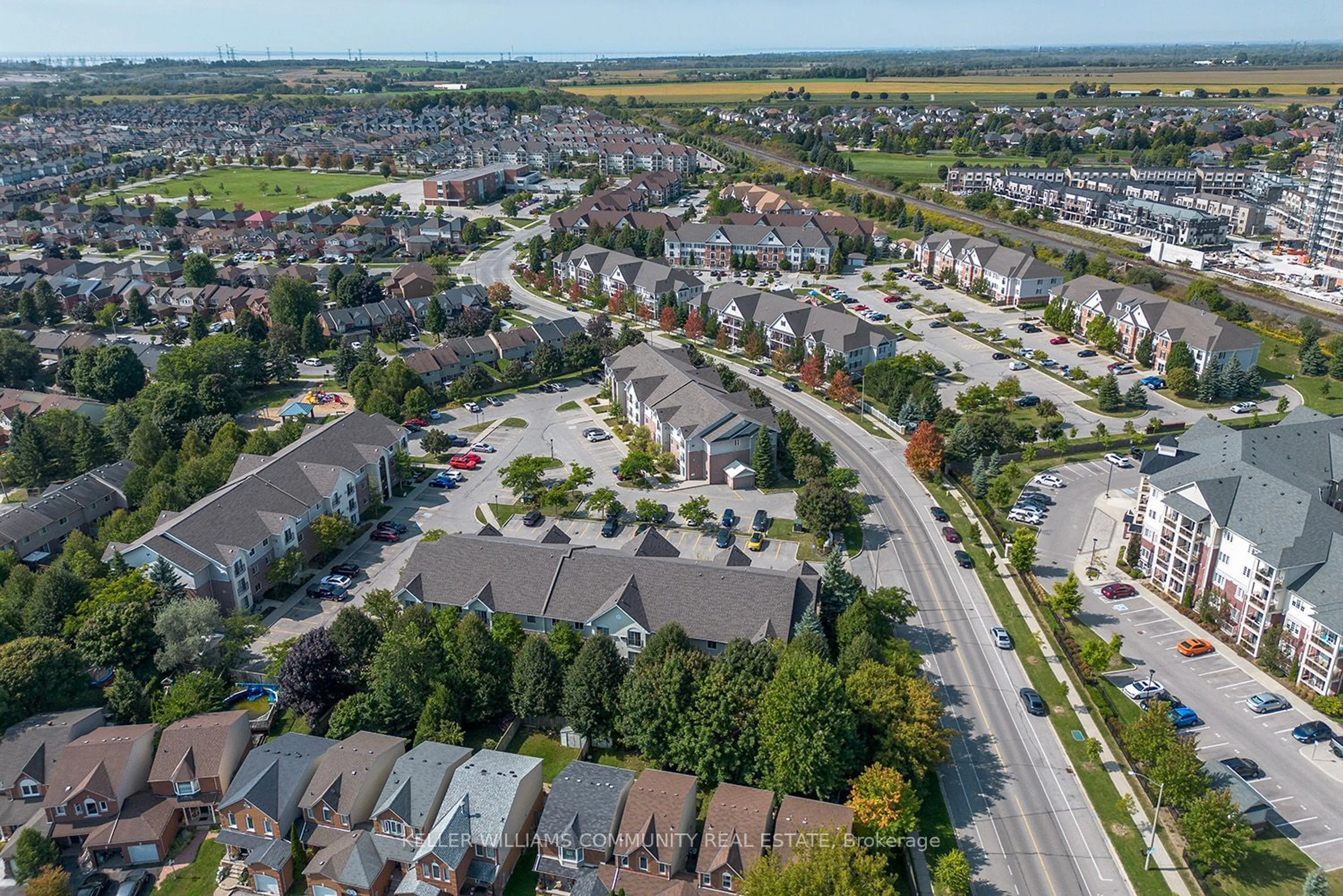 A pic from exterior of the house or condo, the street view for 91 Aspen Springs Dr #301, Clarington Ontario L1C 5J9