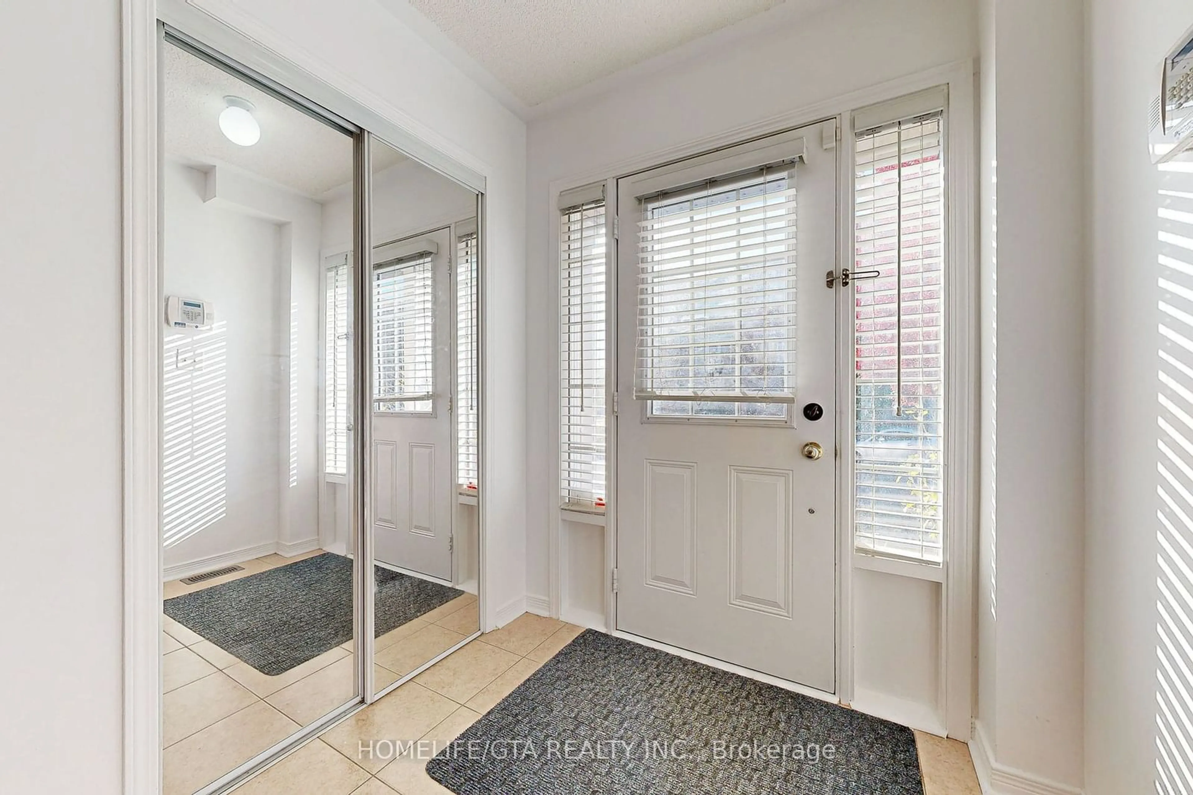 Indoor entryway, wood floors for 50 Curran Hall Cres, Toronto Ontario M1G 0A2