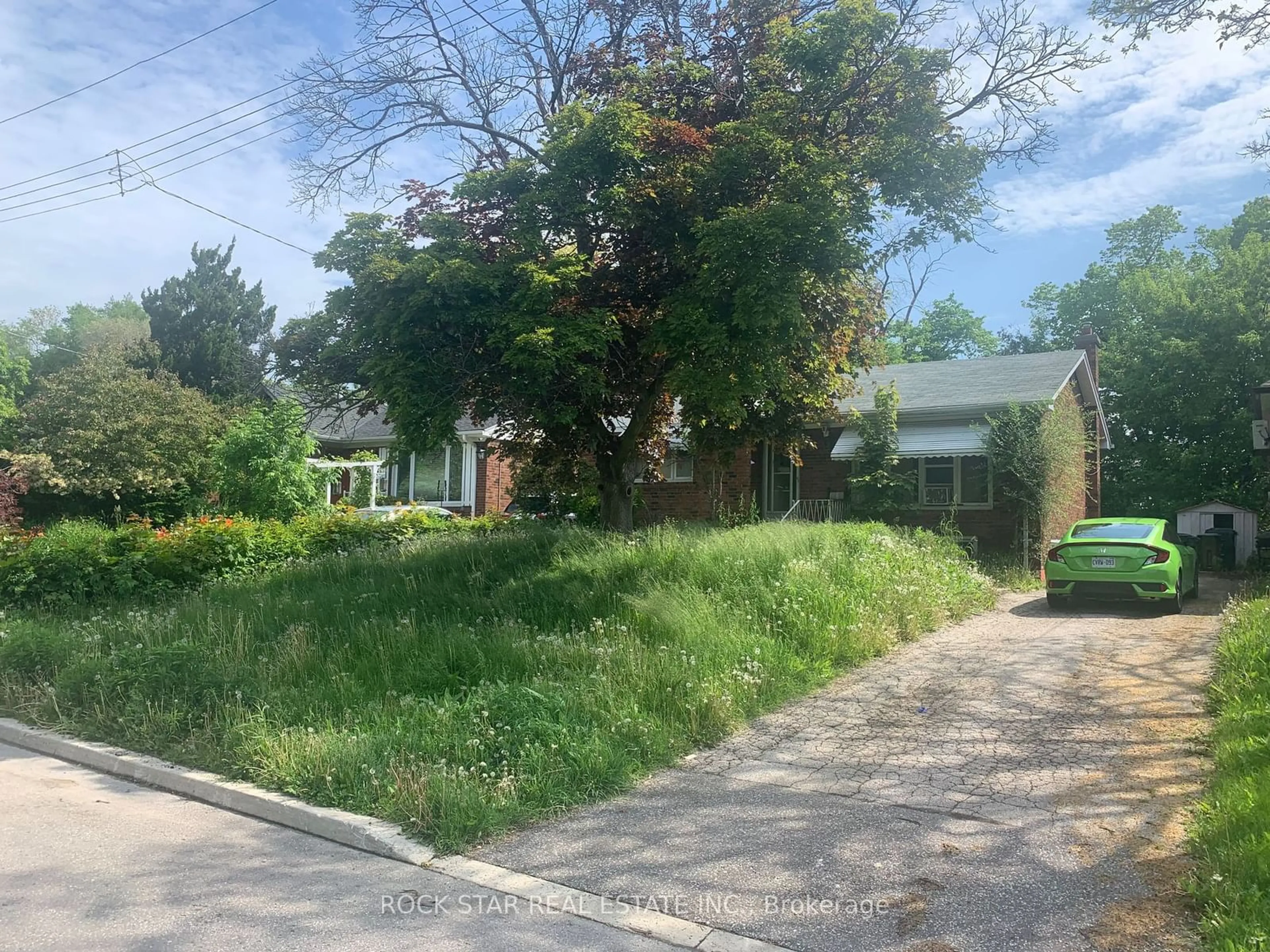 Frontside or backside of a home, the street view for 49 Ivordale Cres, Toronto Ontario M1R 2W7