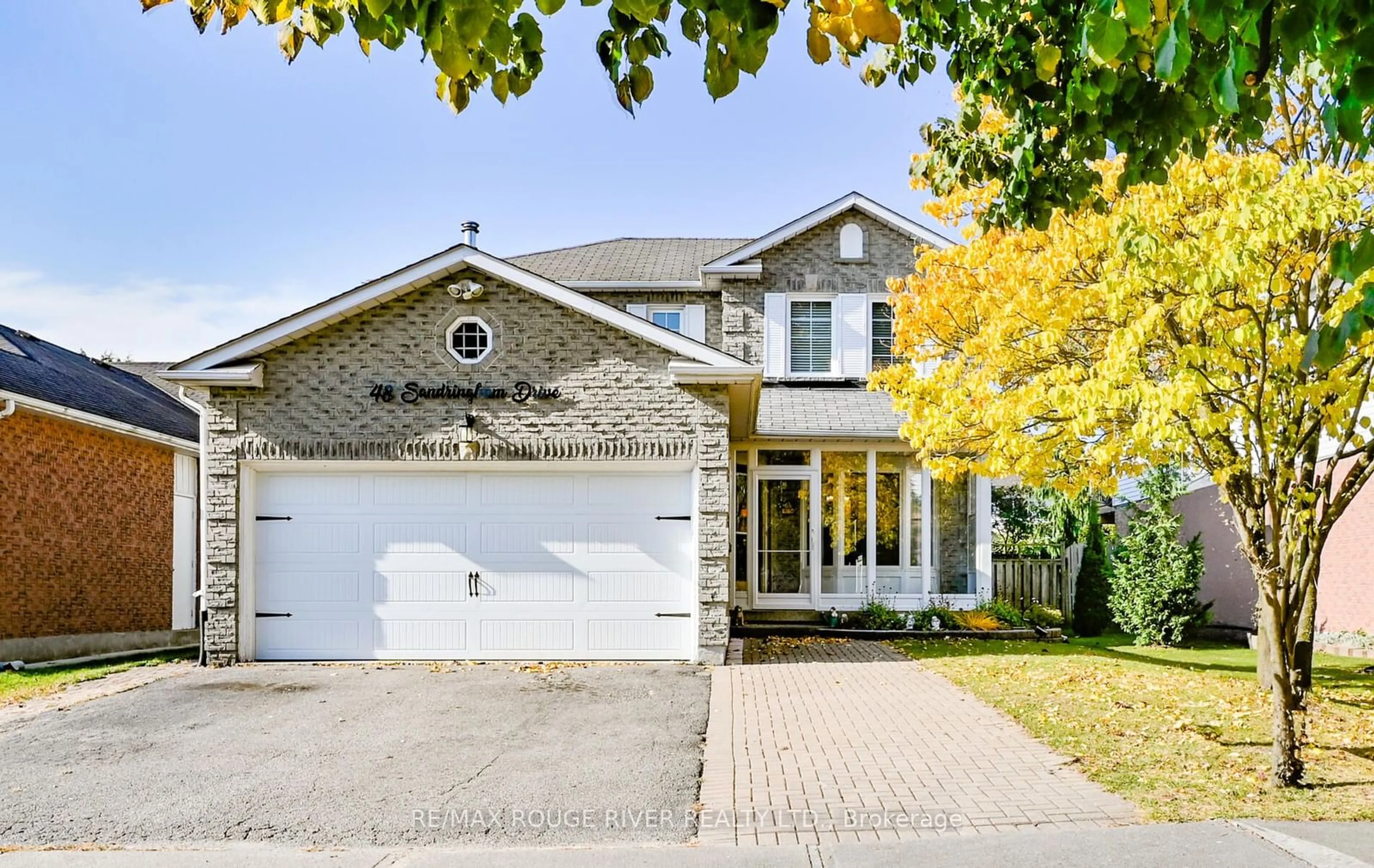 Frontside or backside of a home, the street view for 48 Sandringham Dr, Clarington Ontario L1E 1X1