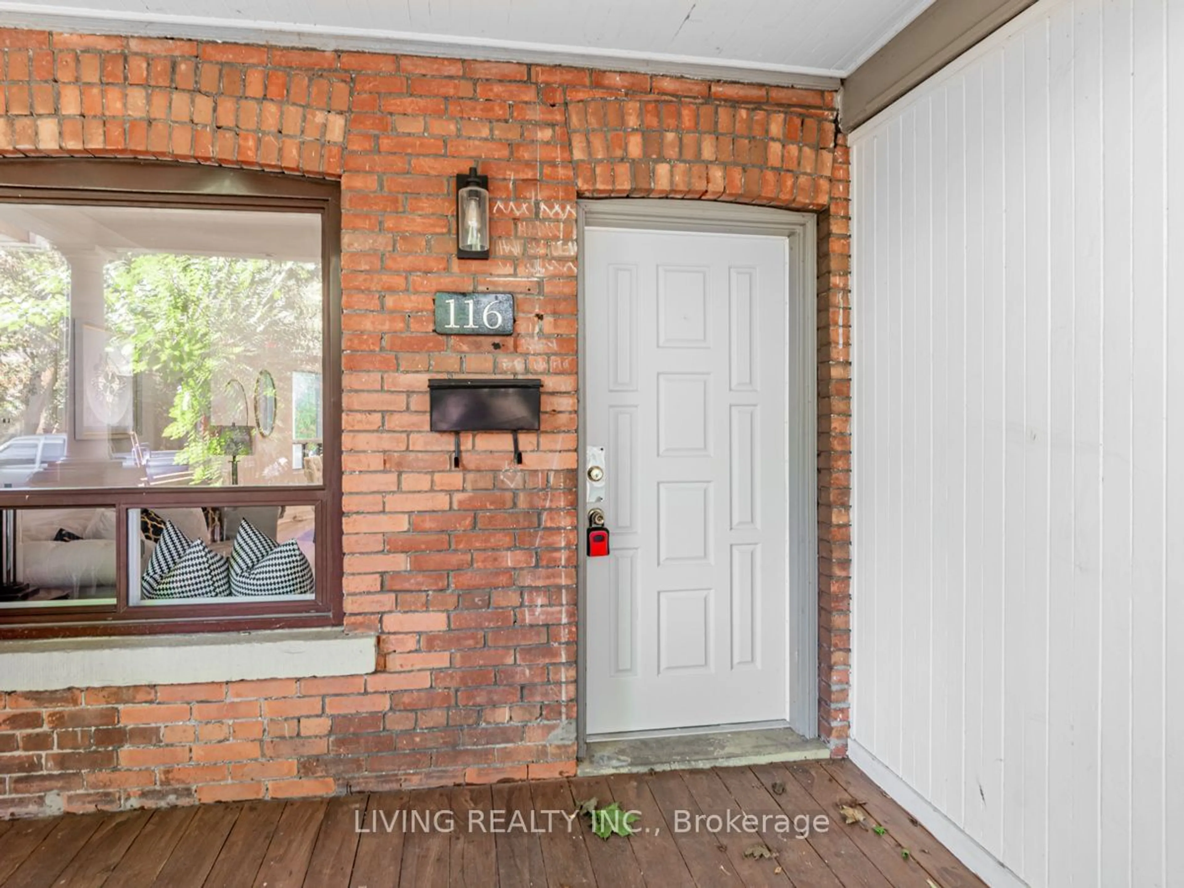 Indoor entryway, wood floors for 116 Roseheath Ave, Toronto Ontario M4C 3P5