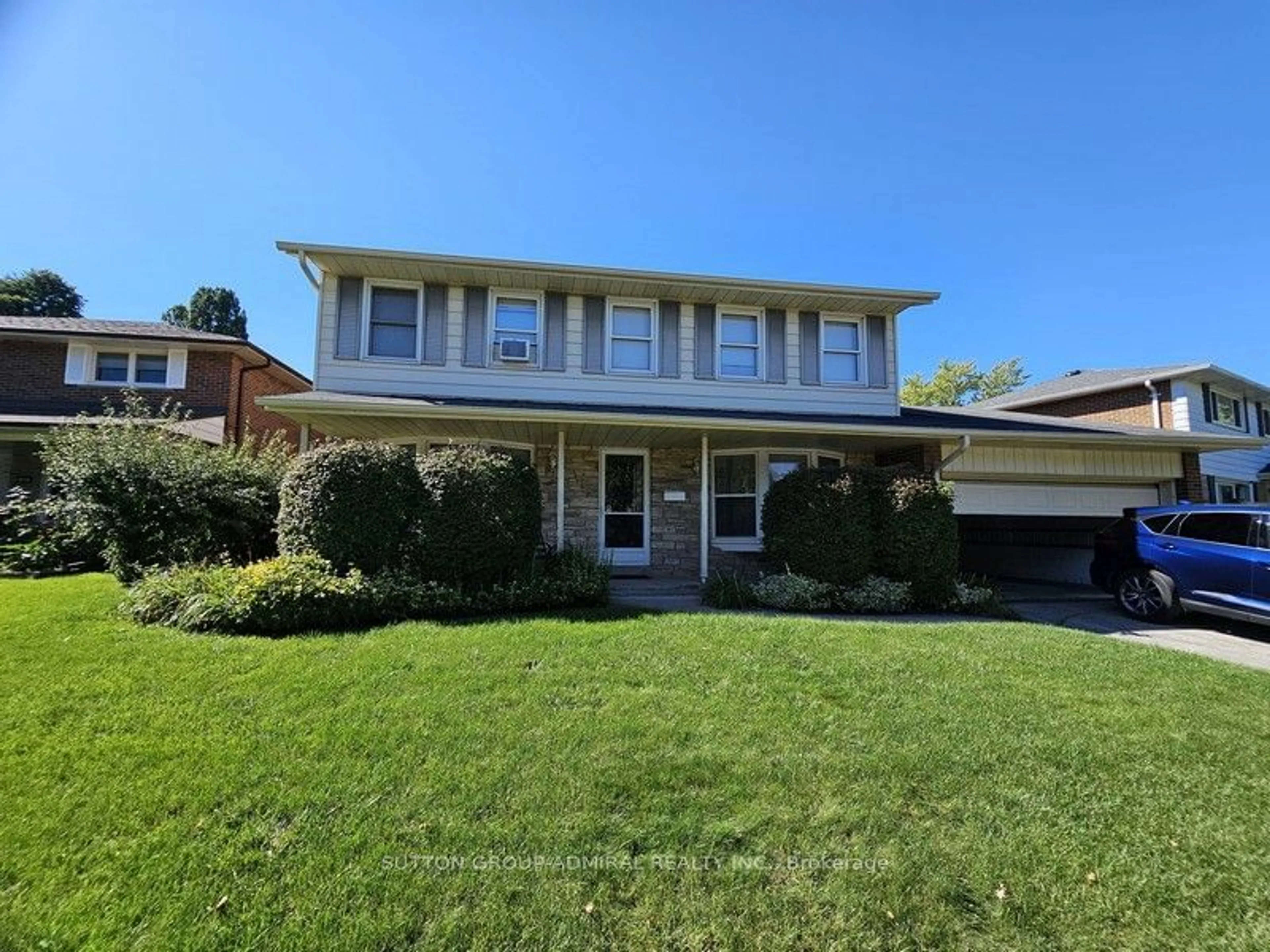 Frontside or backside of a home, the street view for 50 Kenmanor Blvd, Toronto Ontario M1W 1R9