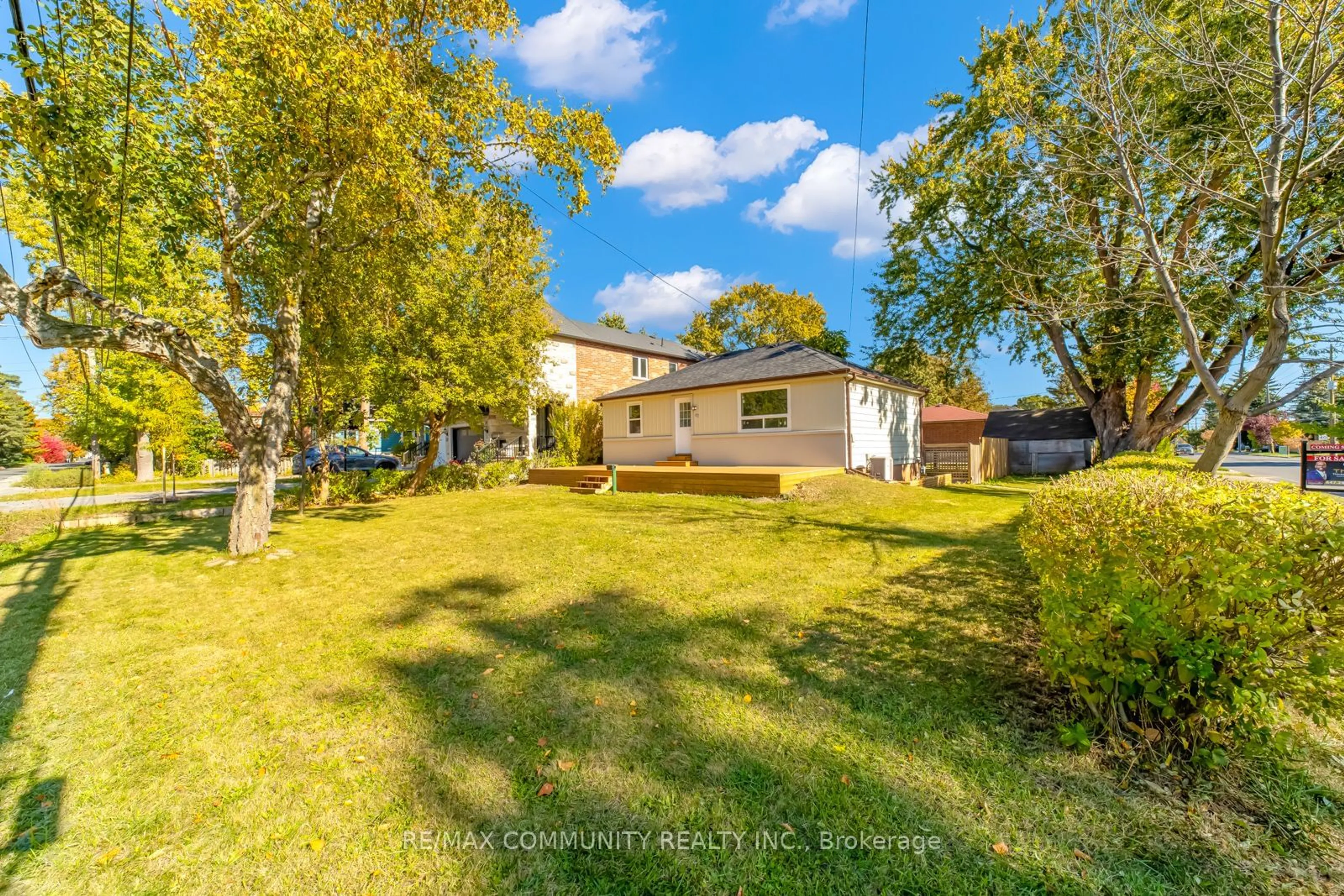 Frontside or backside of a home, the fenced backyard for 67 Homestead Rd, Toronto Ontario M1E 3S1