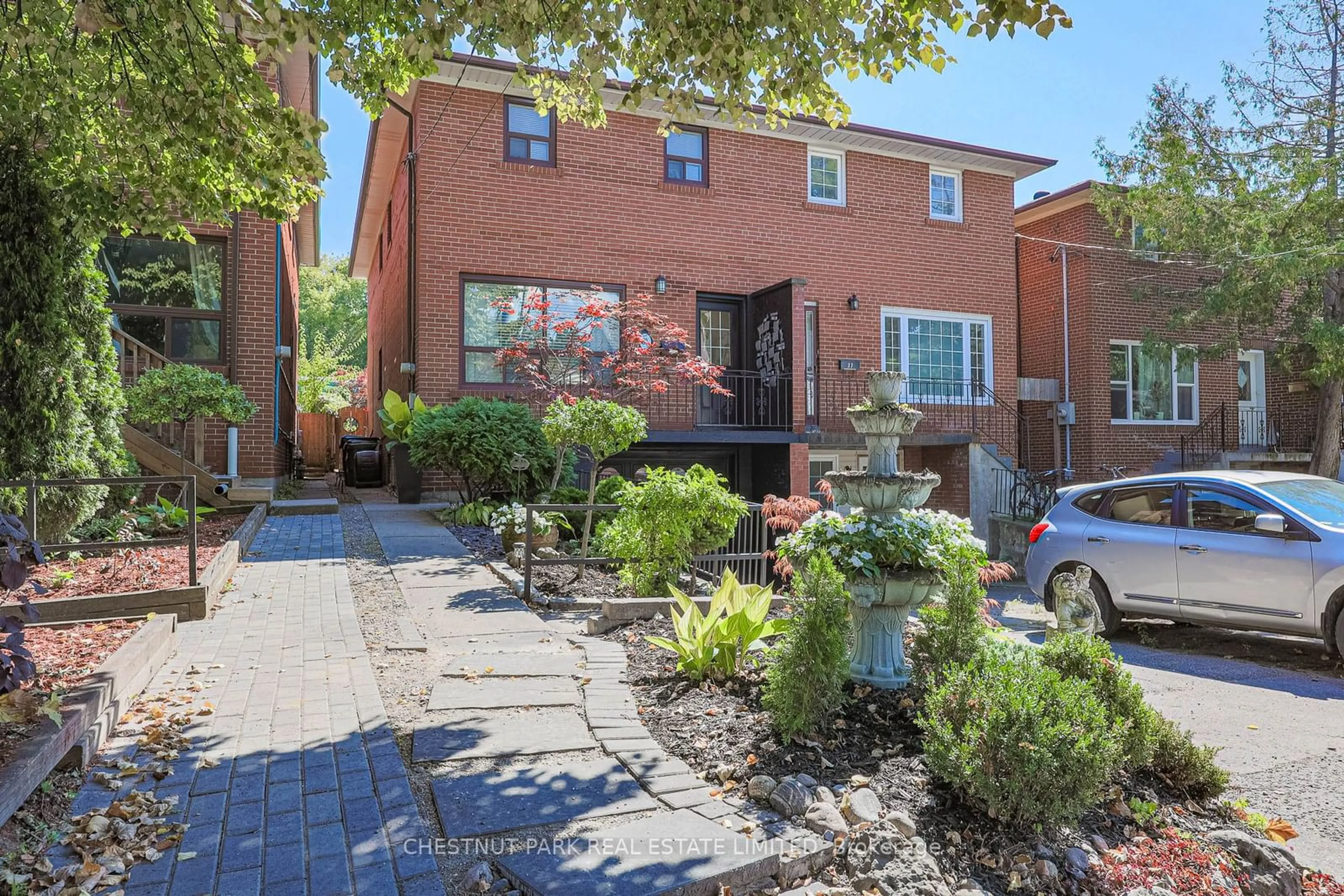 Home with brick exterior material for 39 Aldergrove Ave, Toronto Ontario M4C 1B3