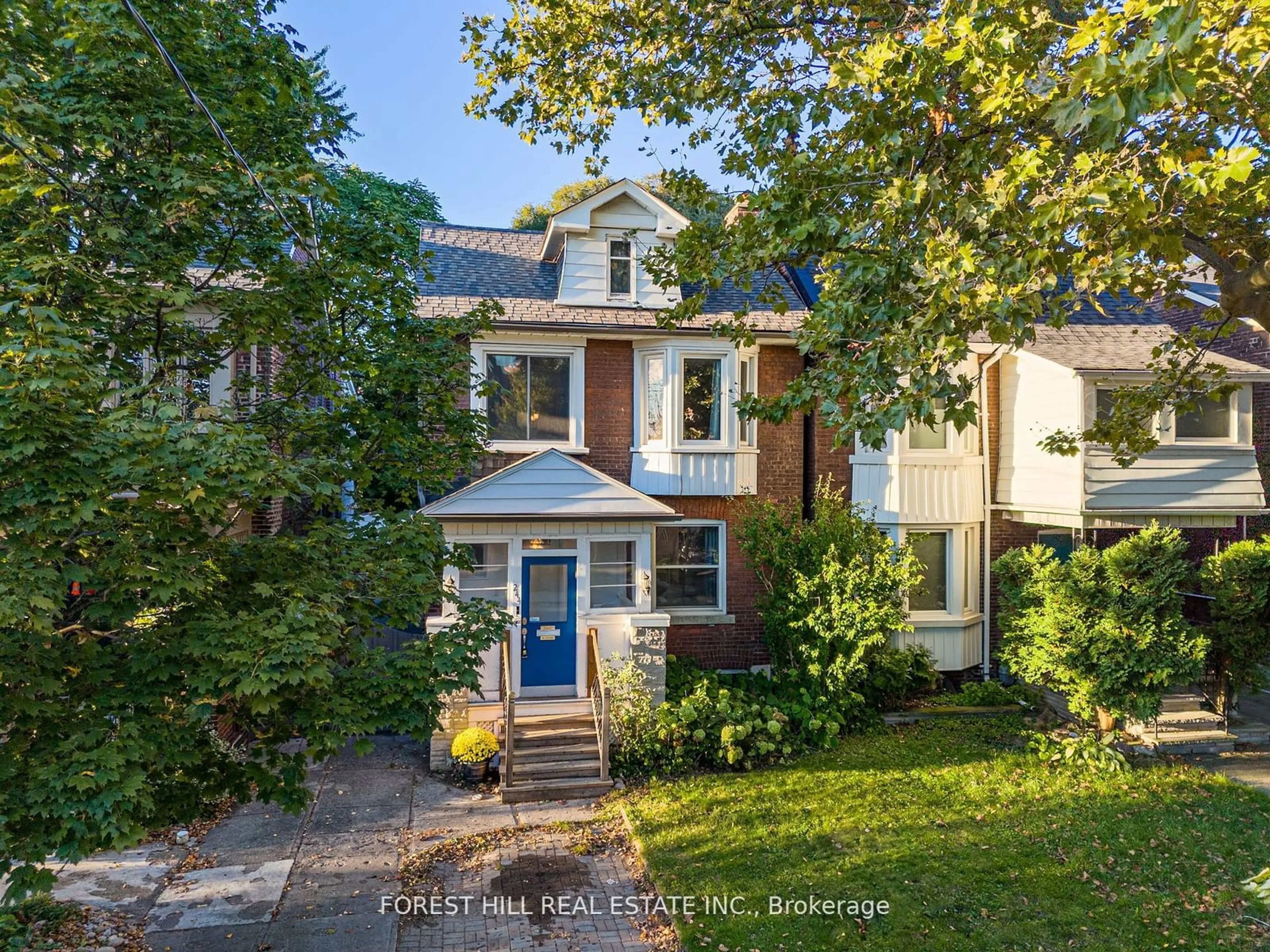 Frontside or backside of a home, the street view for 244 Strathmore Blvd, Toronto Ontario M4J 1P6