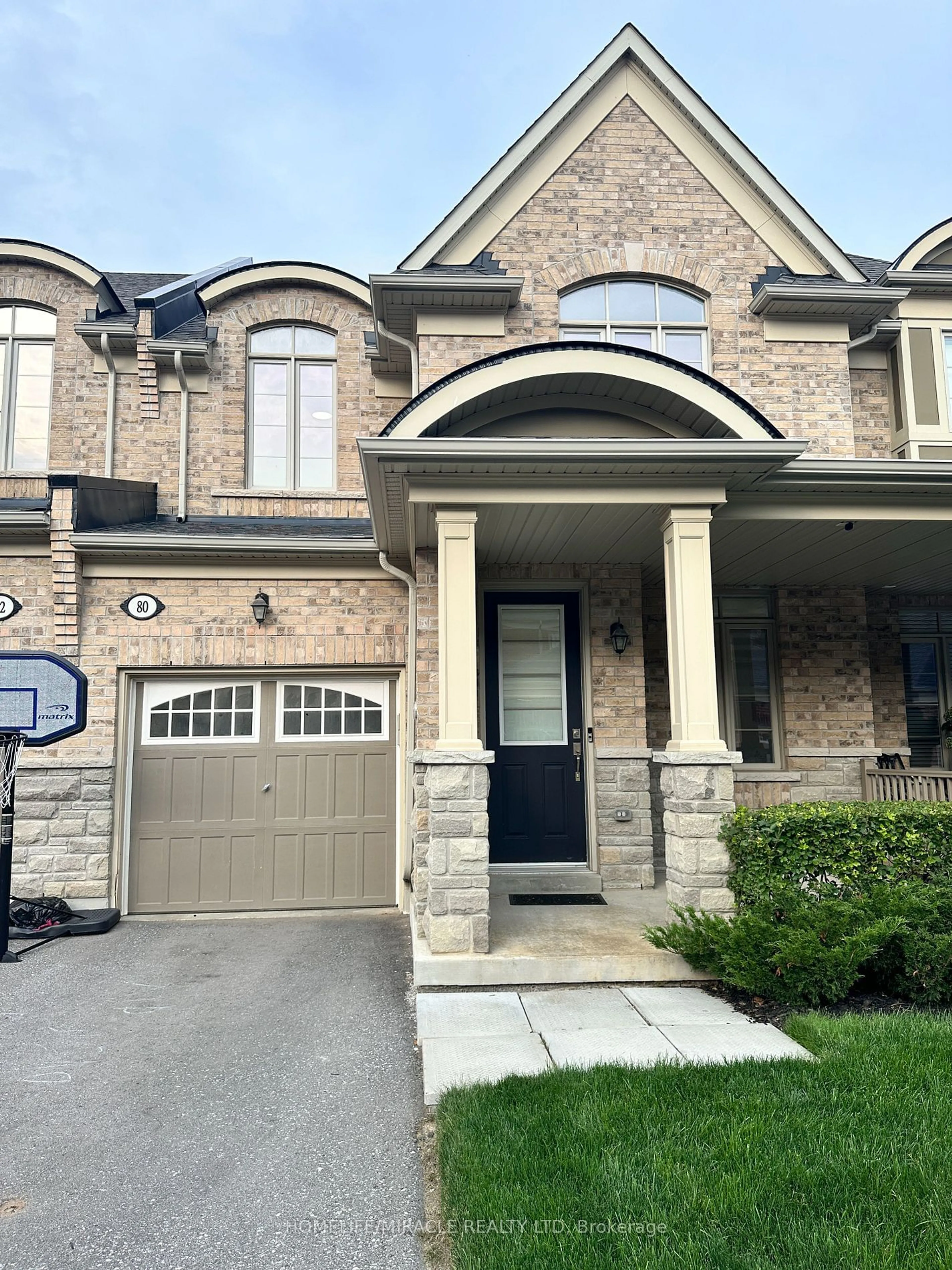 Home with brick exterior material for 80 Workmen's Circ, Ajax Ontario L1T 0N7