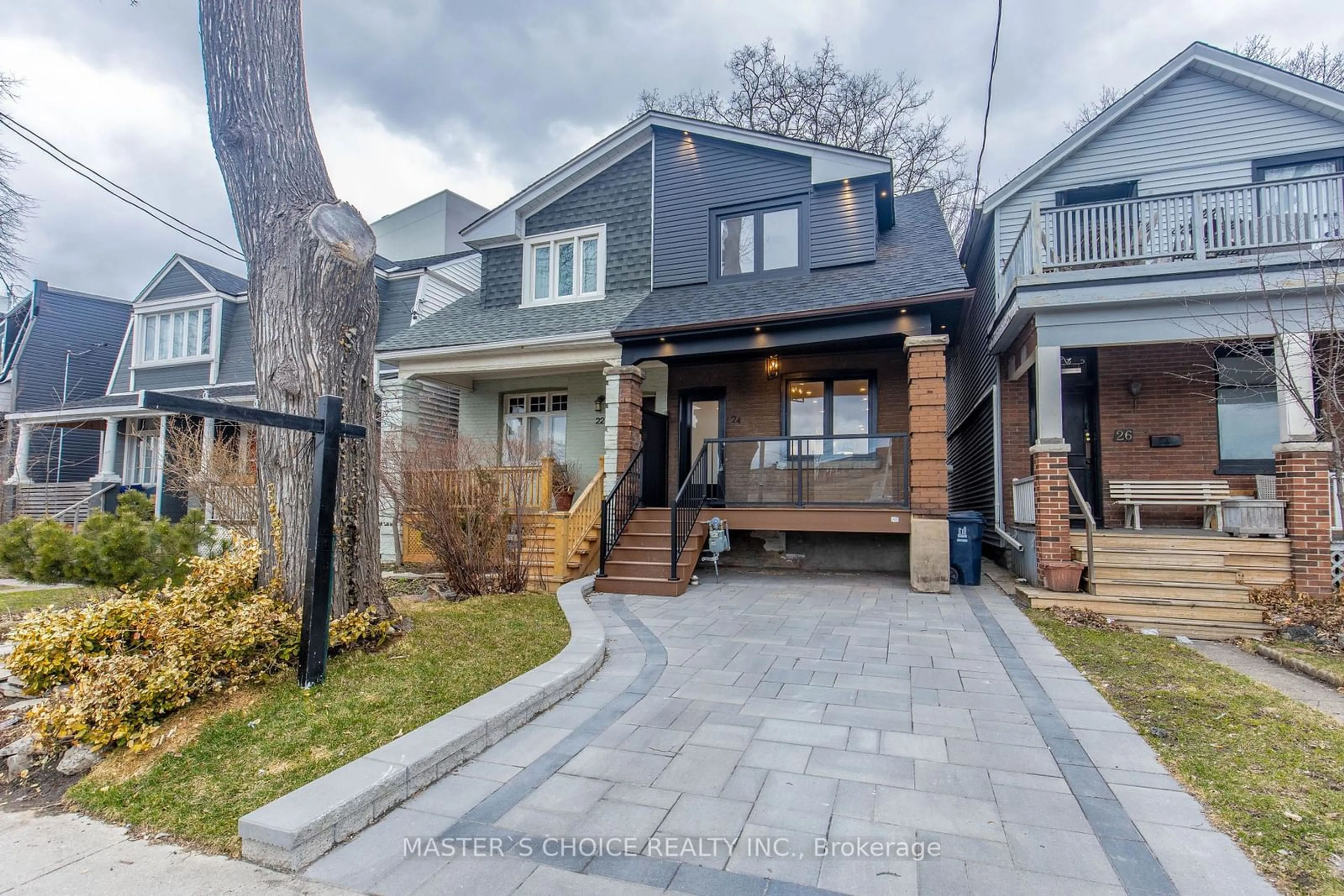 Frontside or backside of a home, the street view for 24 Erindale Ave, Toronto Ontario M4K 1R9