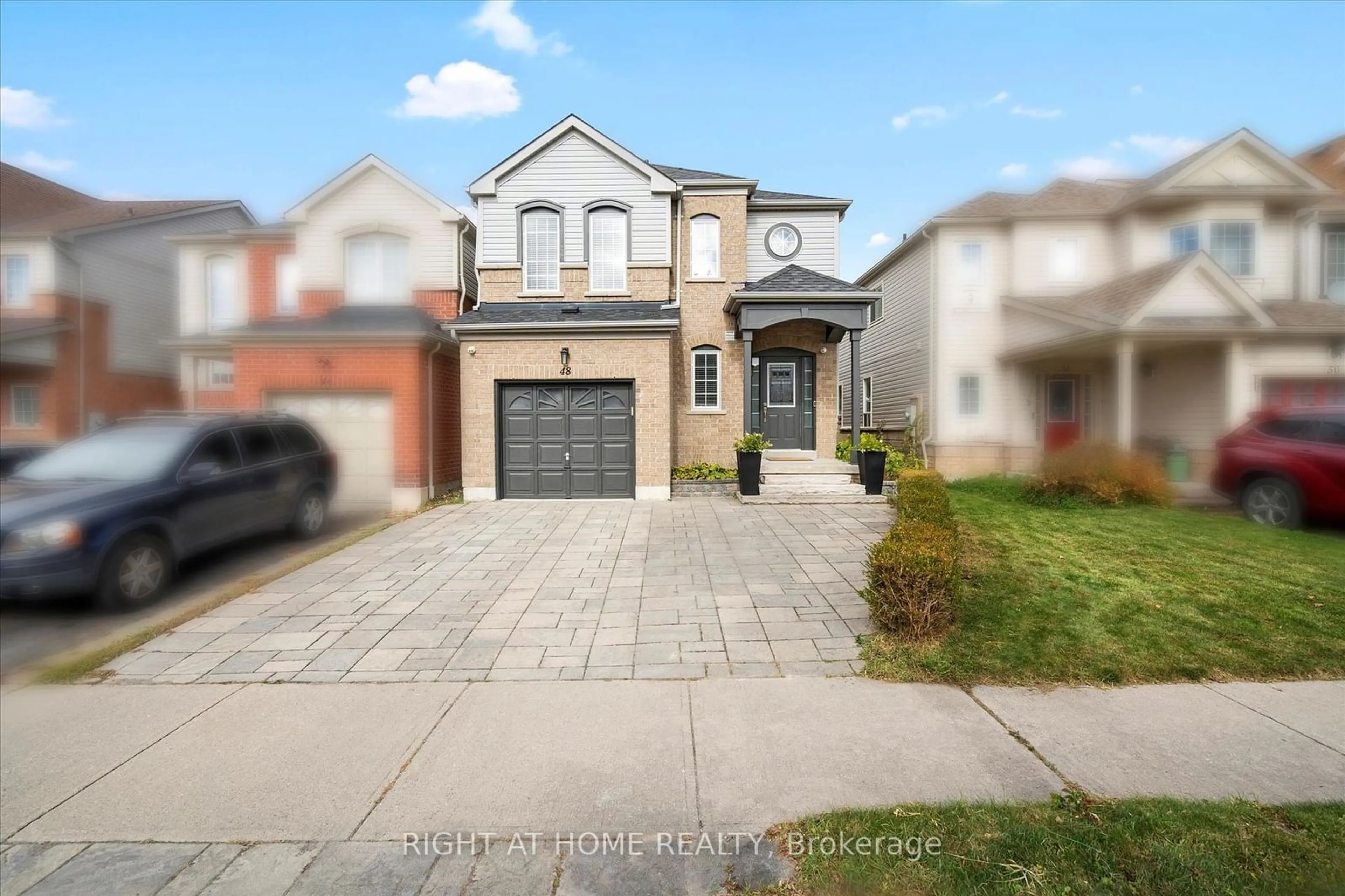 Frontside or backside of a home, the street view for 48 Beachgrove Cres, Whitby Ontario L1R 3G3