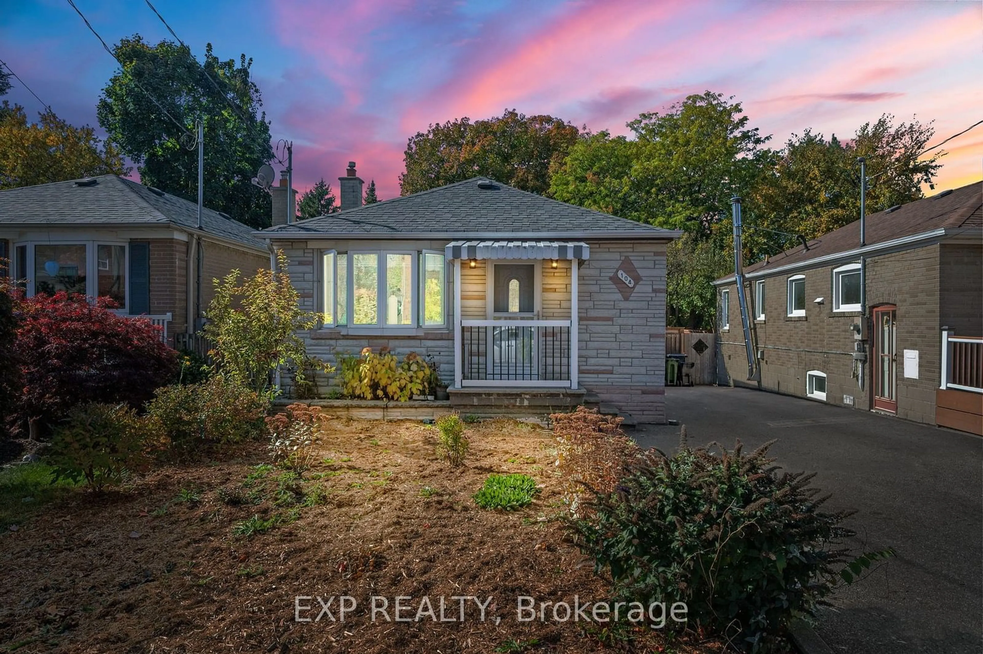 Frontside or backside of a home, the fenced backyard for 104 Natal Ave, Toronto Ontario M1N 3V6