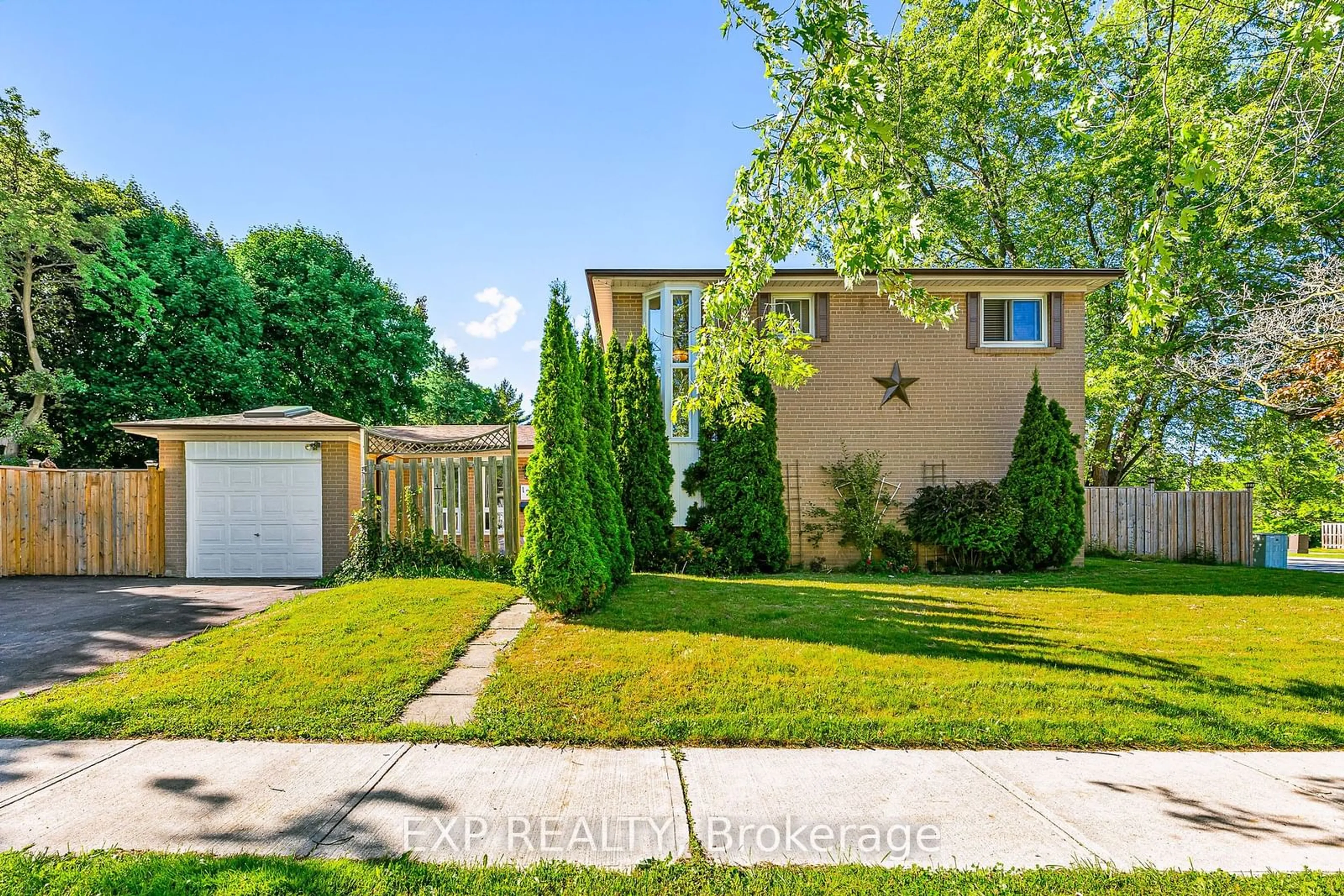 Frontside or backside of a home, the fenced backyard for 126 Slan Ave, Toronto Ontario M1G 3B9