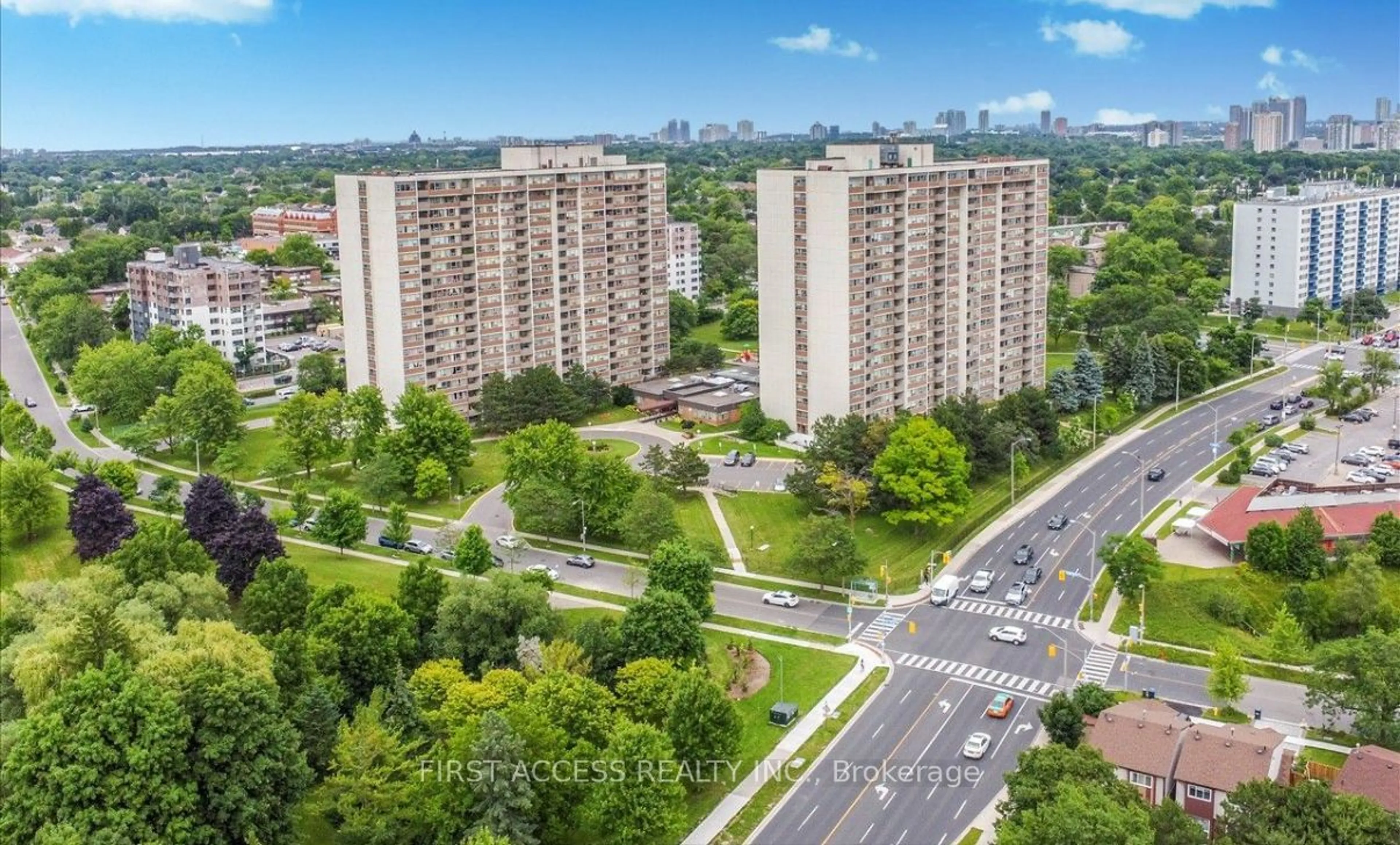 A pic from exterior of the house or condo, the view of city buildings for 25 Silver Springs Blvd #111, Toronto Ontario M1V 1M9