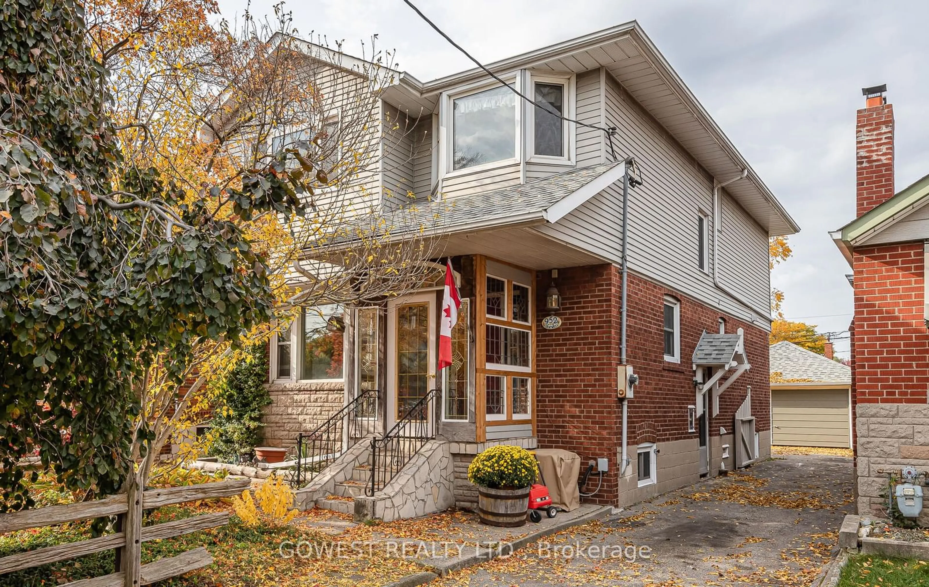 A pic from exterior of the house or condo, the street view for 952 Coxwell Ave, Toronto Ontario M4C 3G3