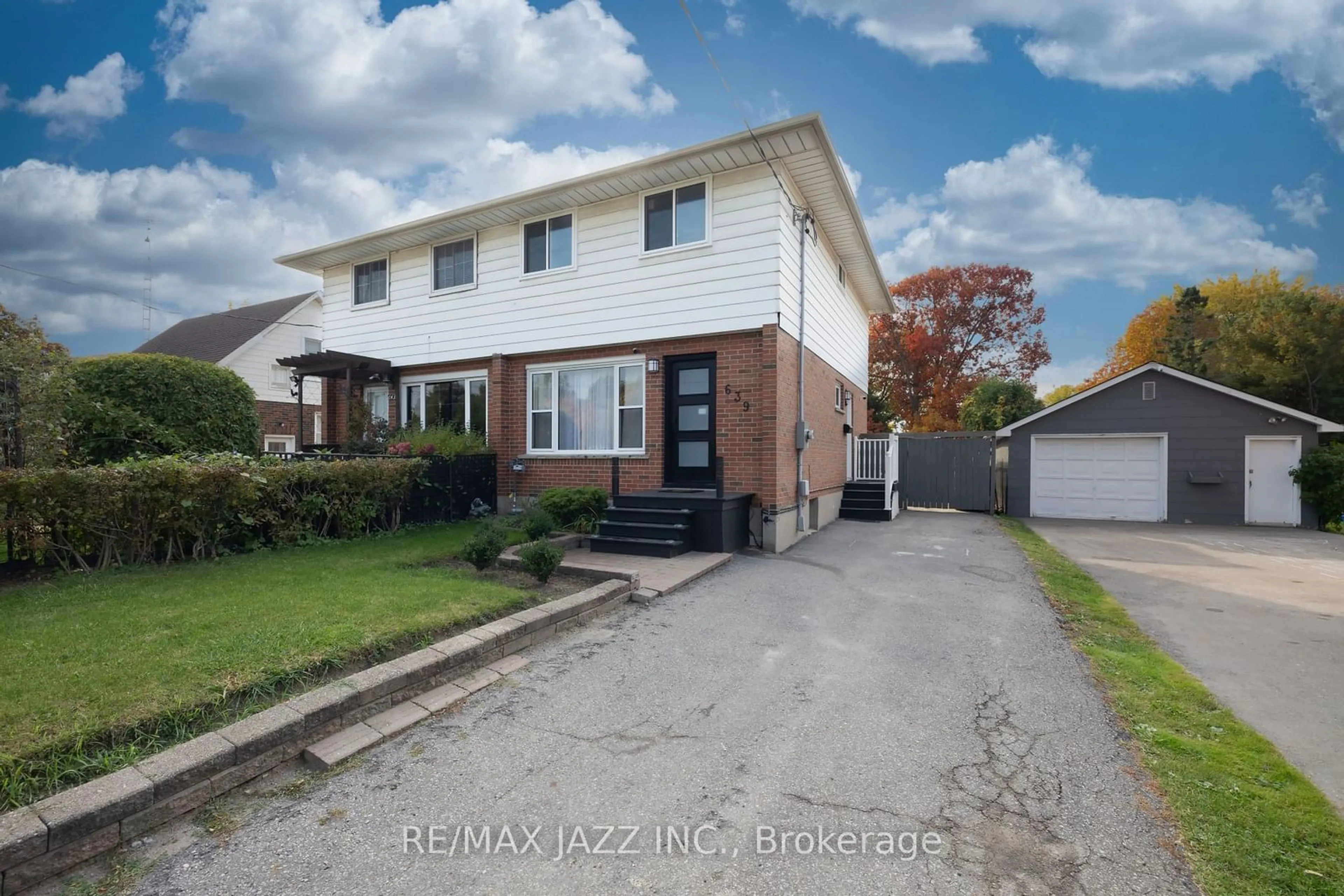 Frontside or backside of a home, the fenced backyard for 639 Bloor St, Oshawa Ontario L1H 3N4