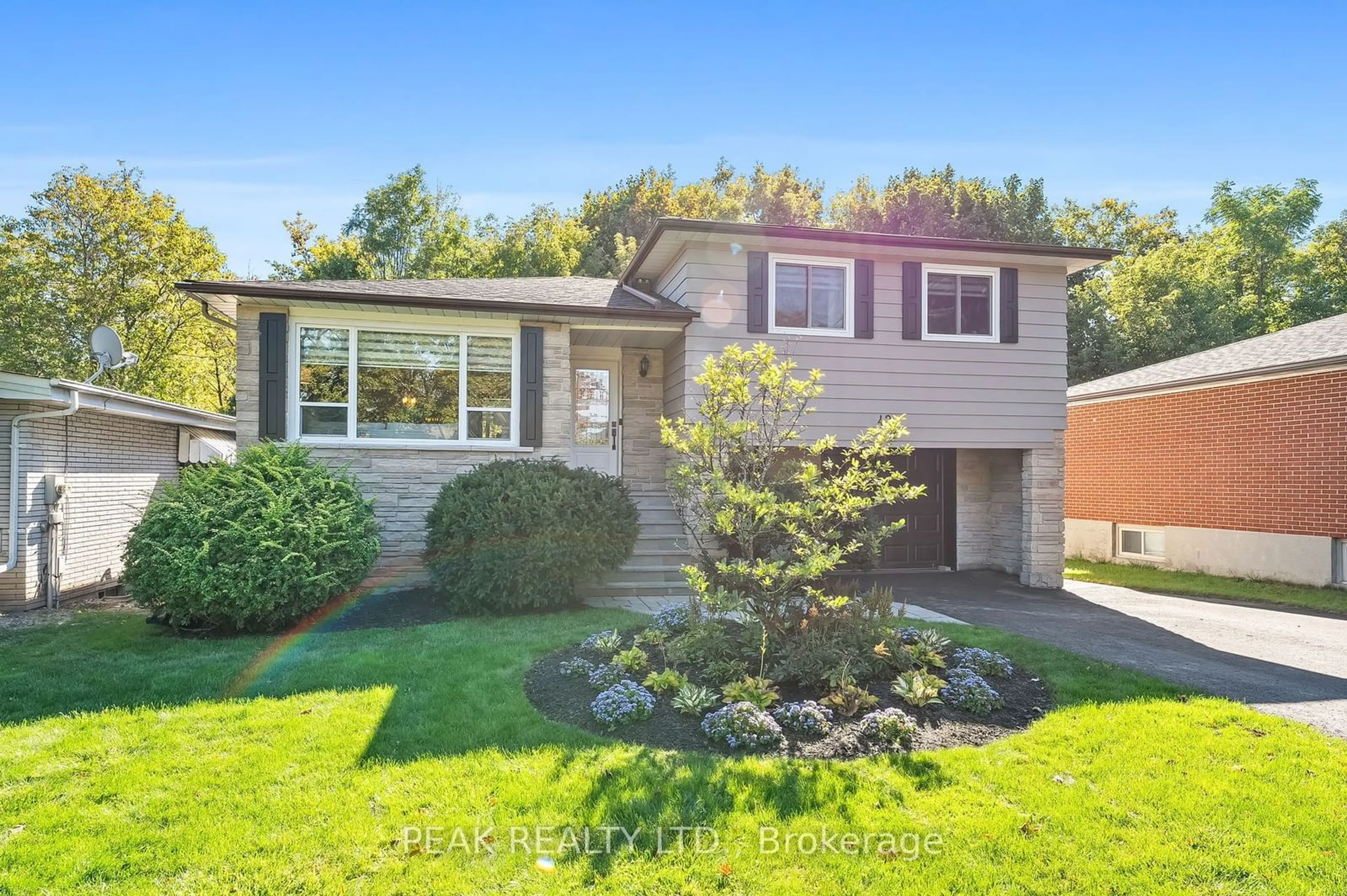 Frontside or backside of a home, the fenced backyard for 421 Hillcroft St, Oshawa Ontario L1G 2M6