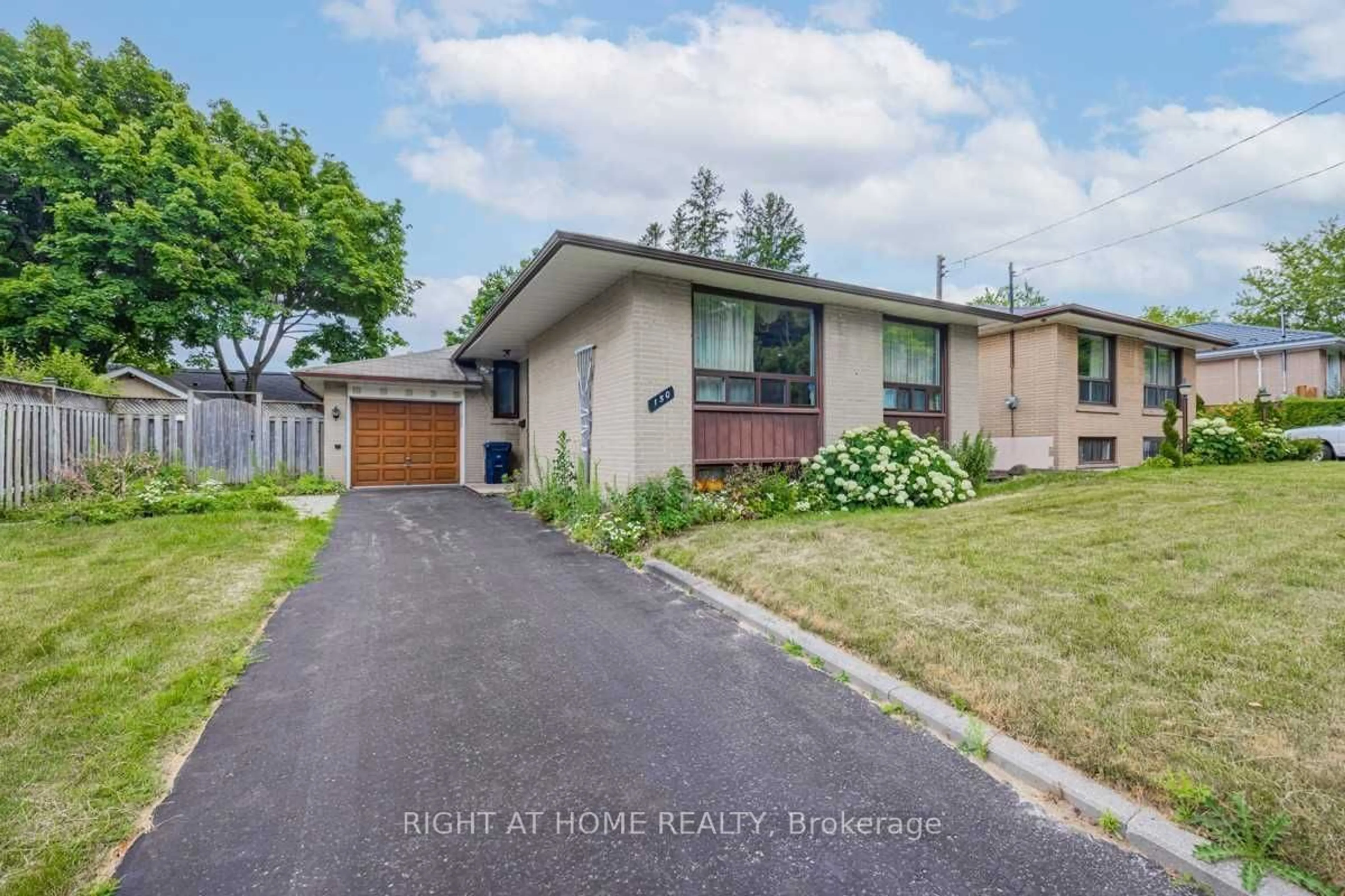 Frontside or backside of a home, the street view for 150 Lord Roberts Dr, Toronto Ontario M1K 3W8