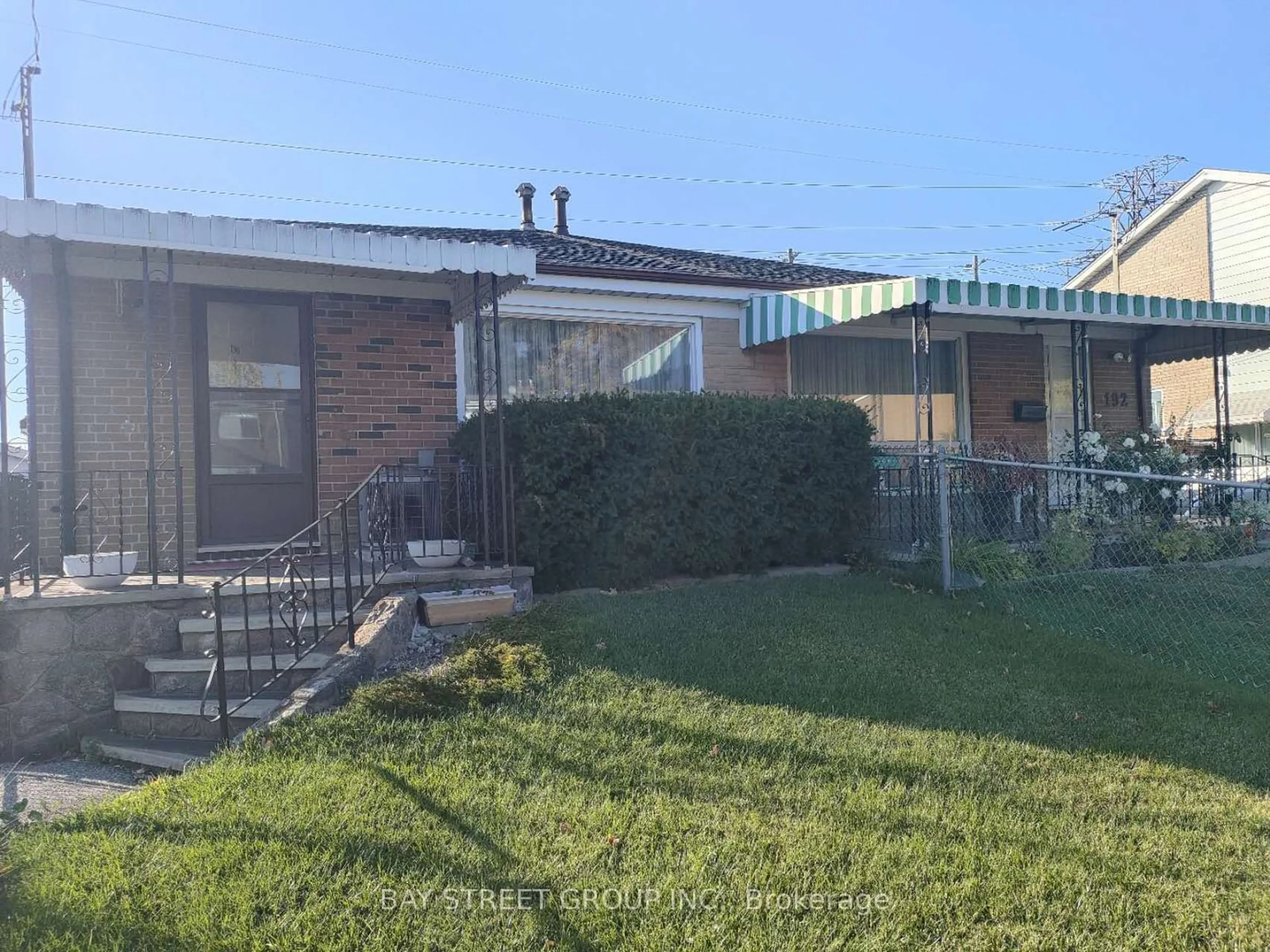 Frontside or backside of a home, the fenced backyard for 190 Santamonica Blvd, Toronto Ontario M1L 4H6