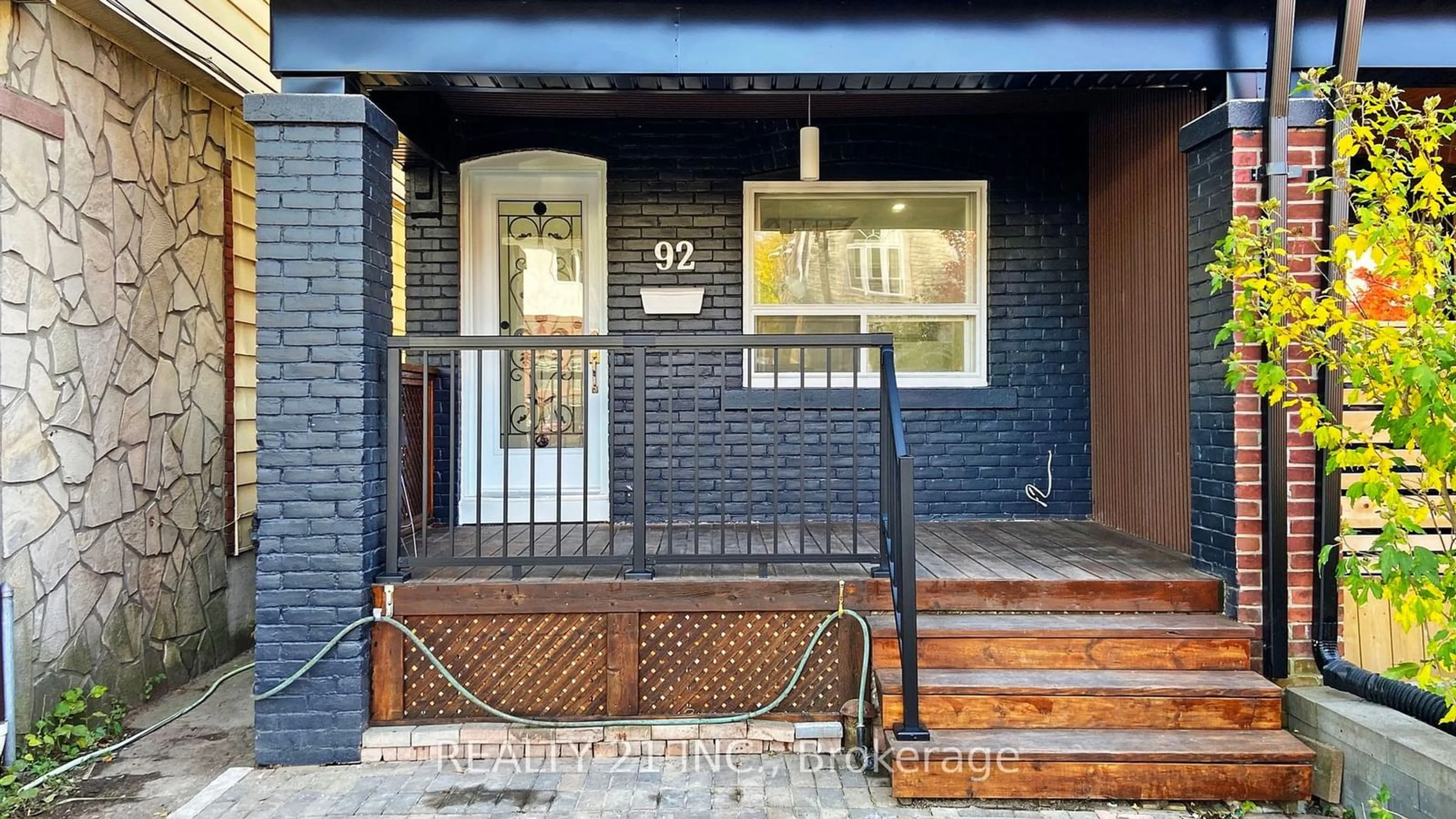 Home with brick exterior material for 92 King Edward Ave, Toronto Ontario M4C 5J6