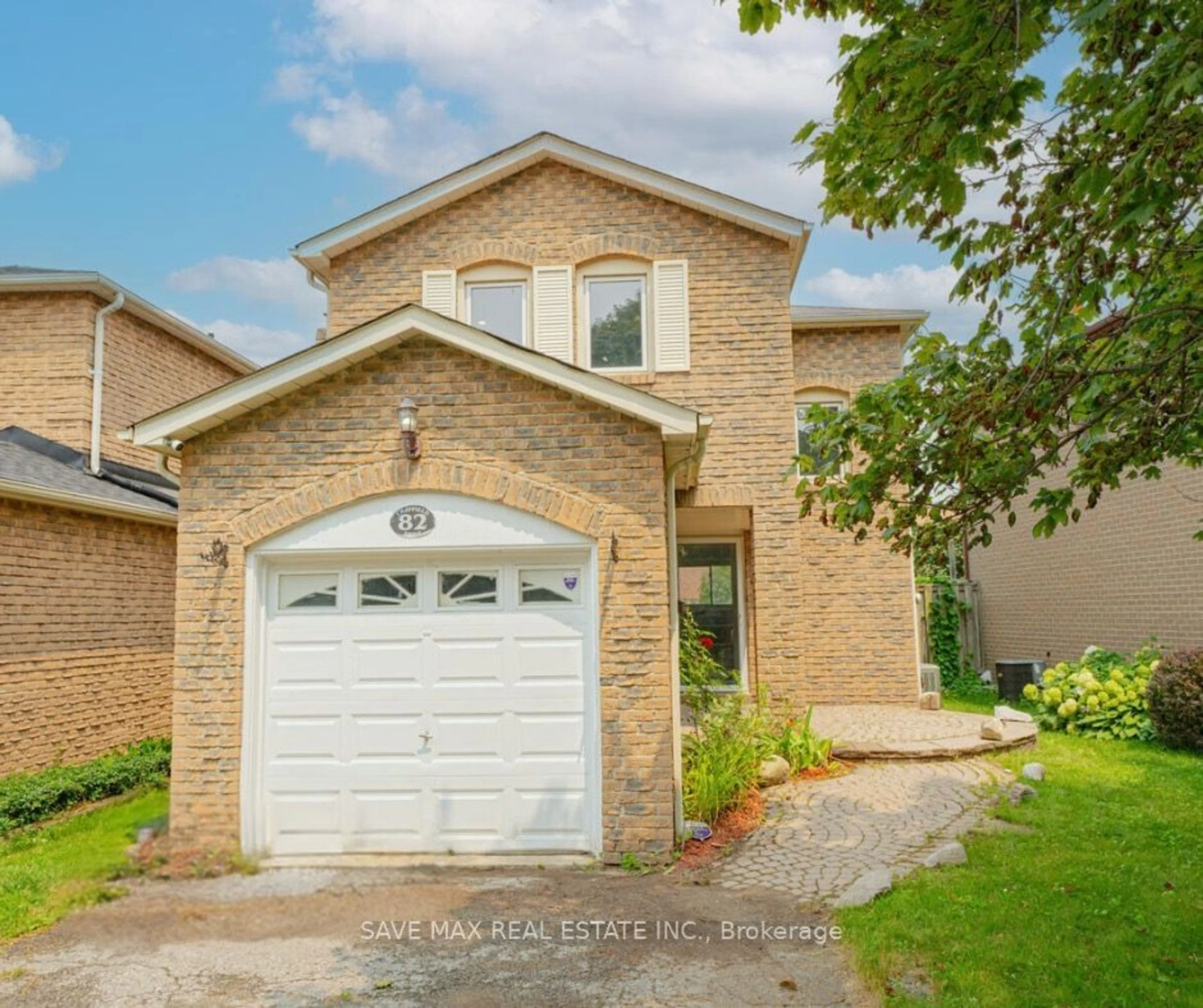 Frontside or backside of a home, the street view for 82 Chatfield Dr, Ajax Ontario L1T 2J9