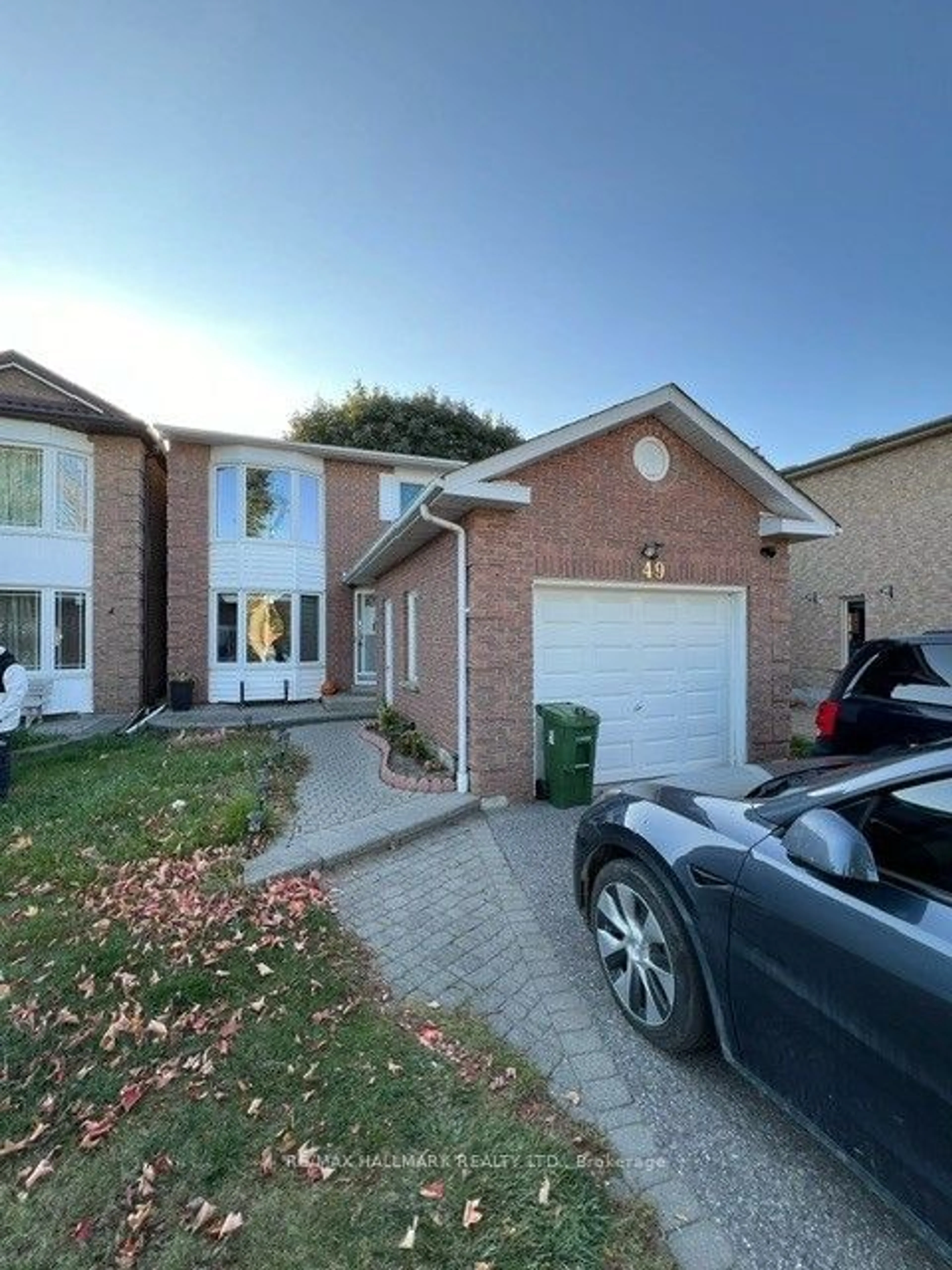 Frontside or backside of a home, the street view for 49 Halfmoon Sq, Toronto Ontario M1C 3V4