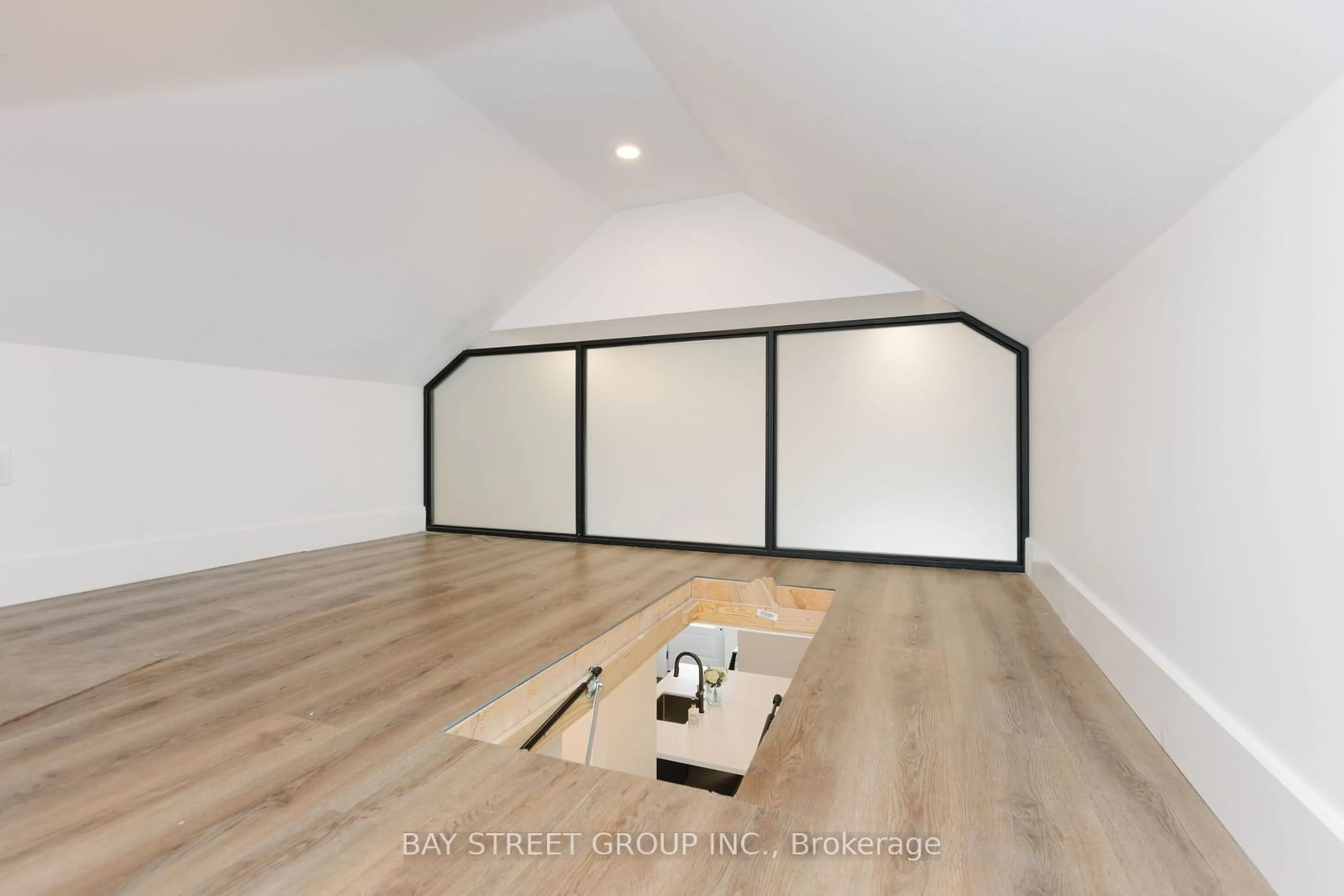 A pic of a room, wood floors for 111 Frankdale Ave, Toronto Ontario M4J 4A4