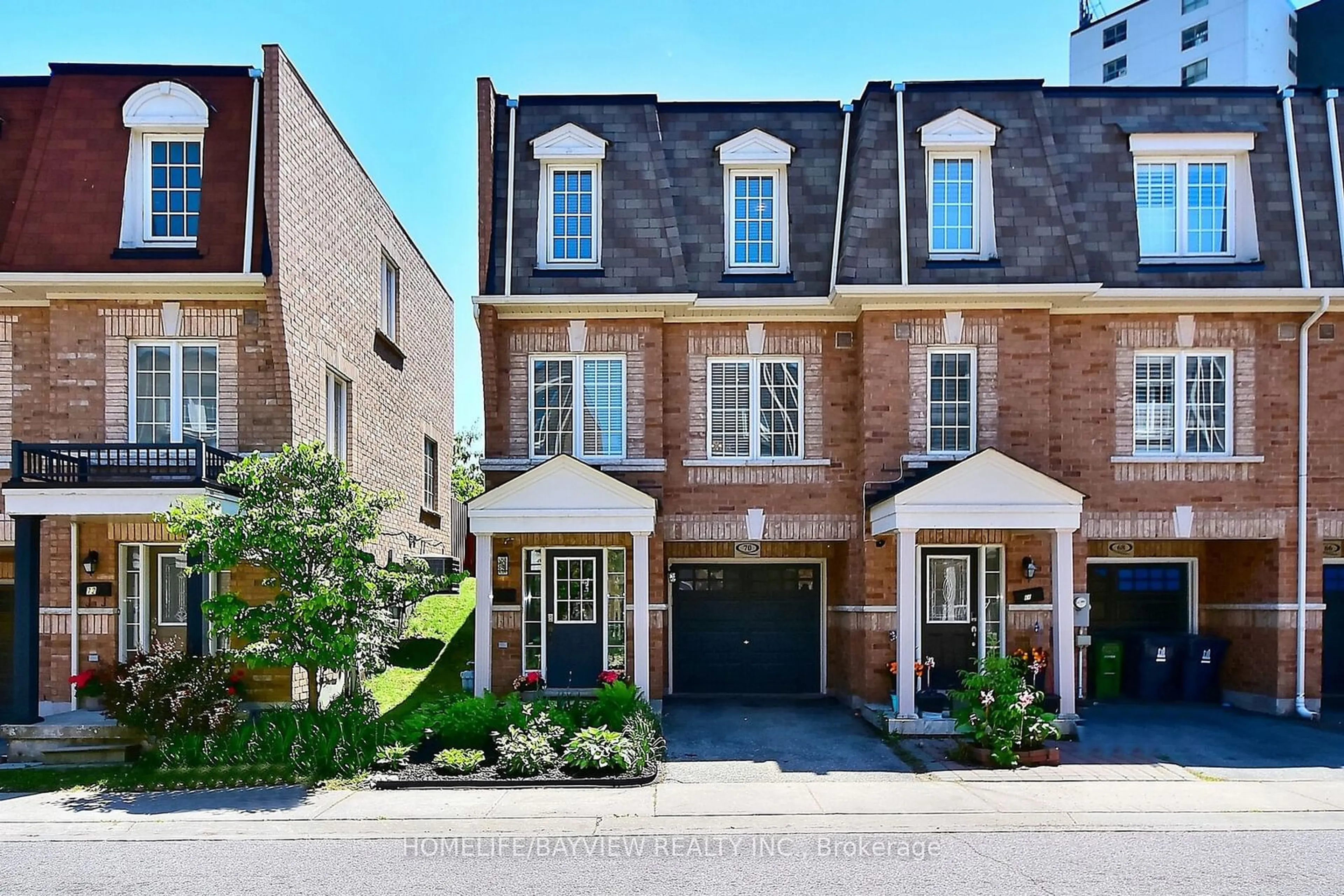 A pic from exterior of the house or condo, the street view for 70 Jeremiah Lane, Toronto Ontario M1J 0A4