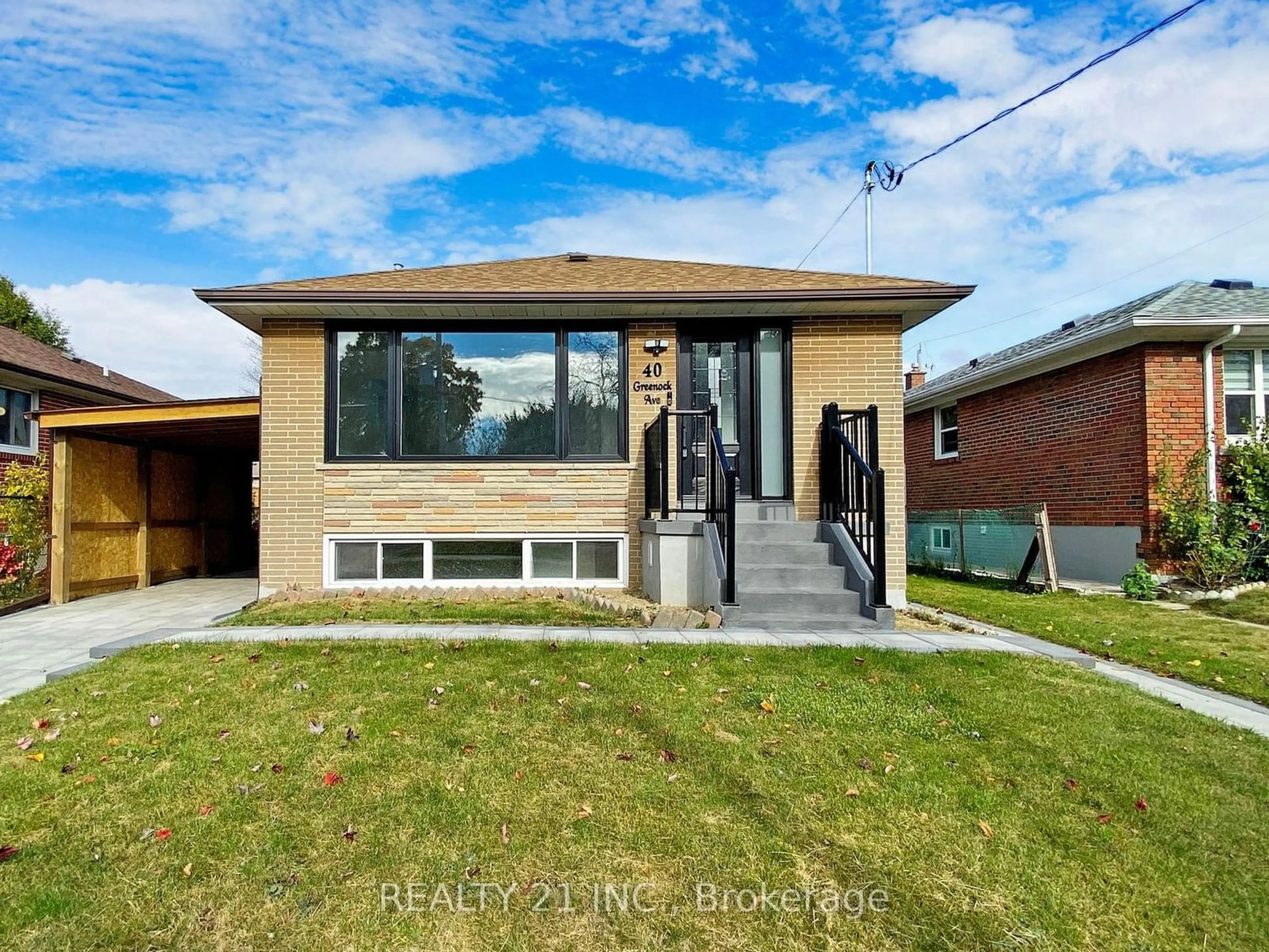 Frontside or backside of a home, the fenced backyard for 40 Greenock Ave, Toronto Ontario M1G 2Z9