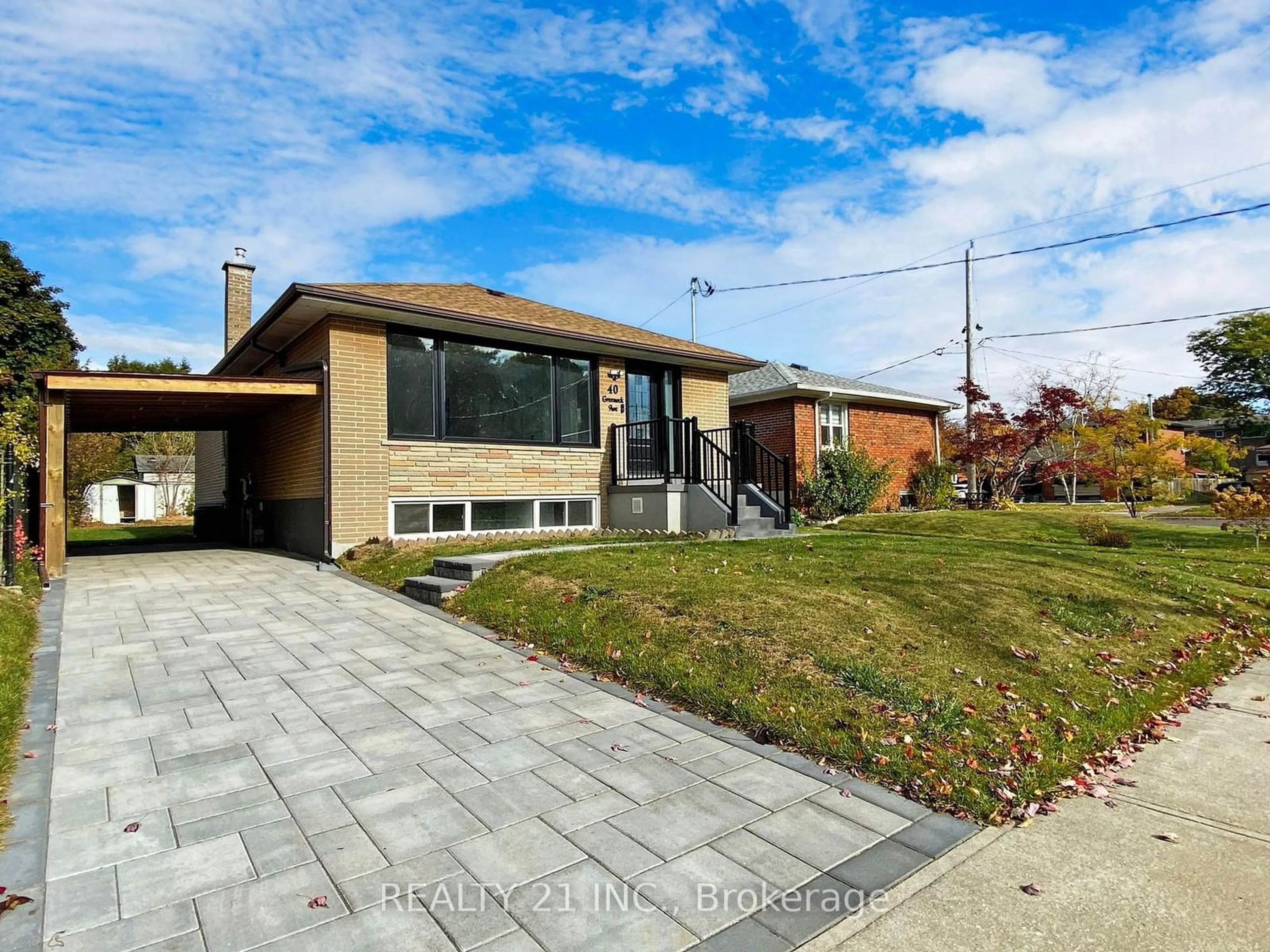 Frontside or backside of a home, the street view for 40 Greenock Ave, Toronto Ontario M1G 2Z9