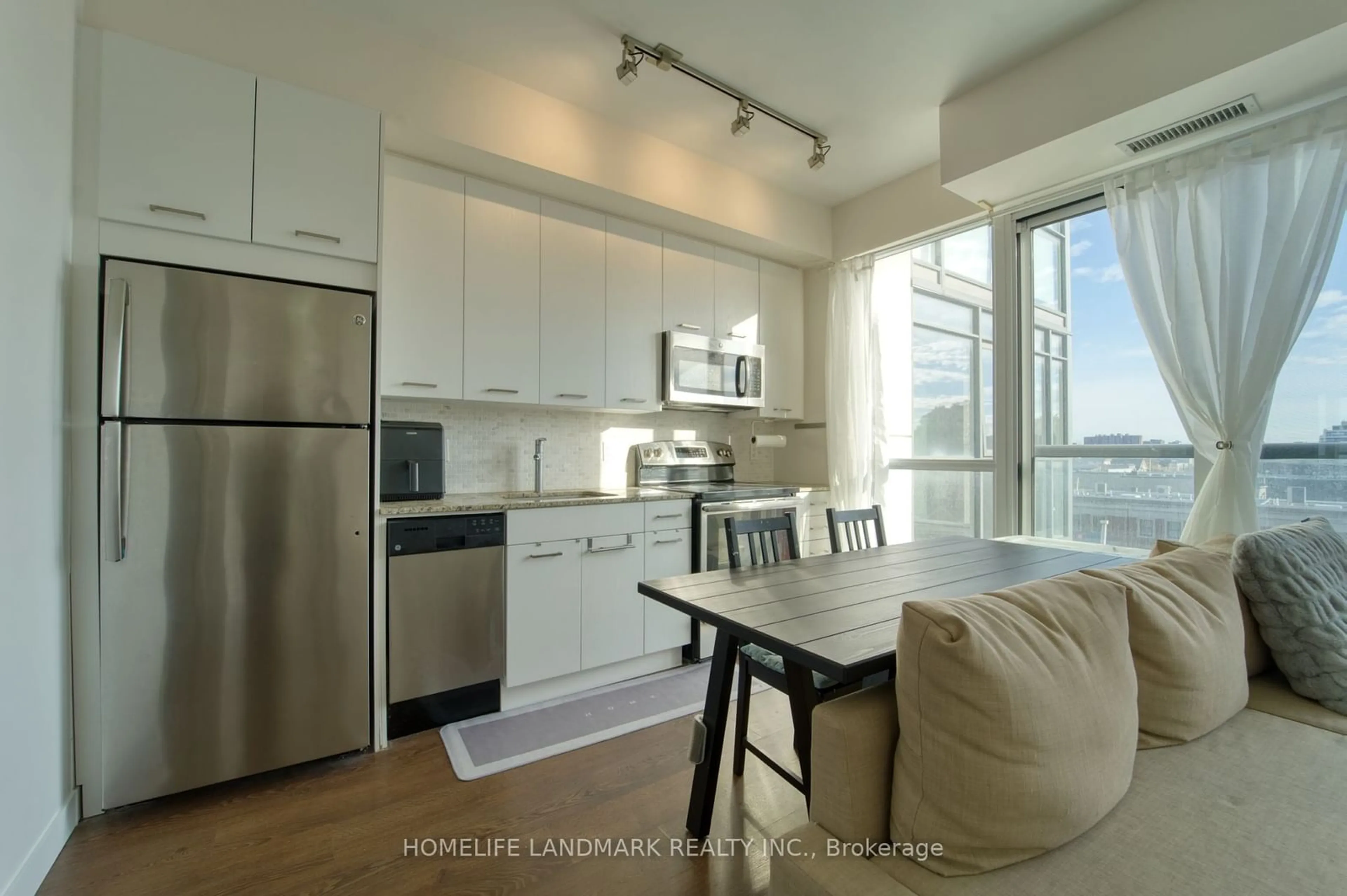 Open concept kitchen for 2055 Danforth Ave #509, Toronto Ontario M4C 1J8