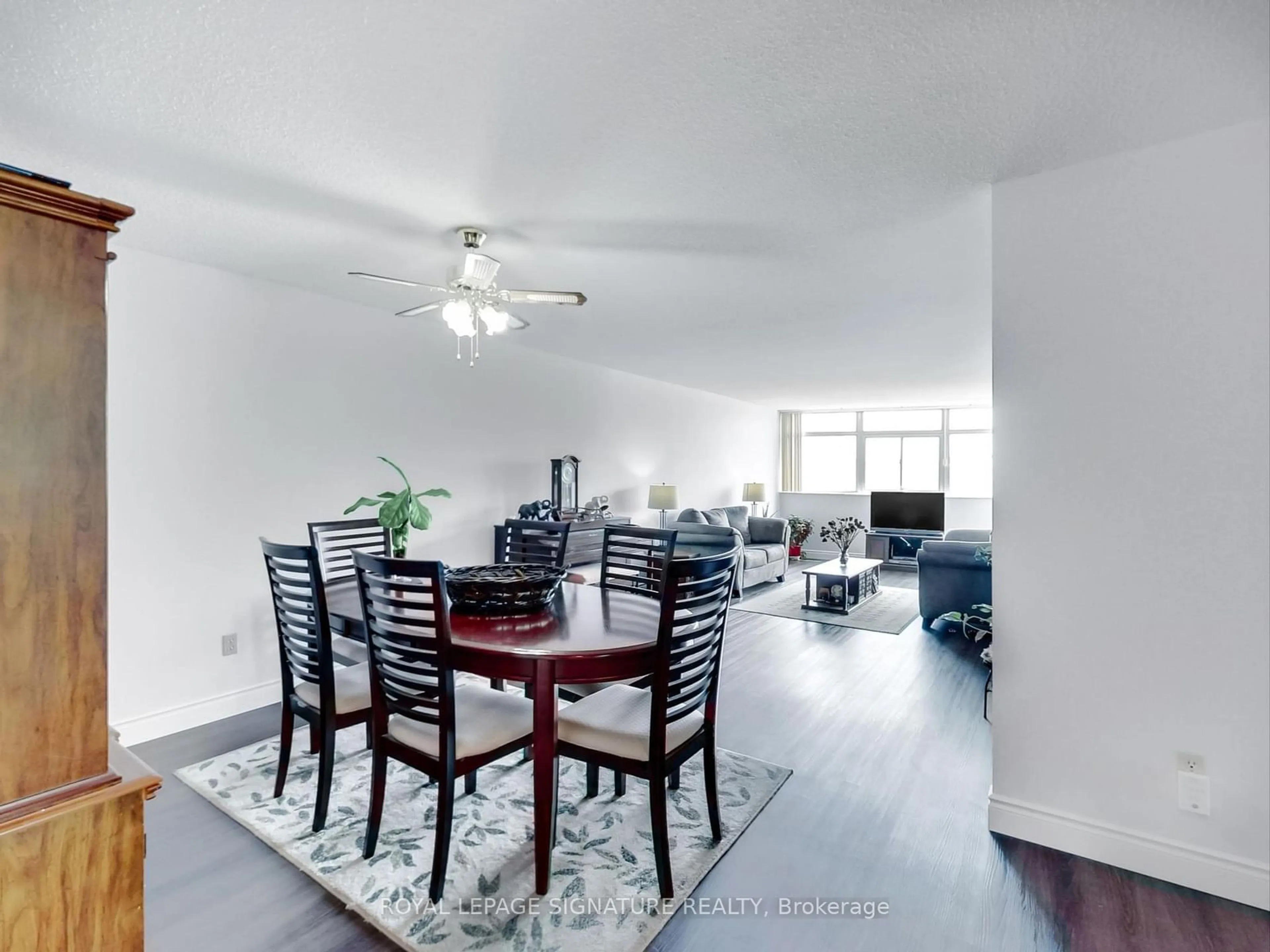 Dining room, wood floors for 3151 Bridletowne Circ #506, Toronto Ontario M1W 2T1