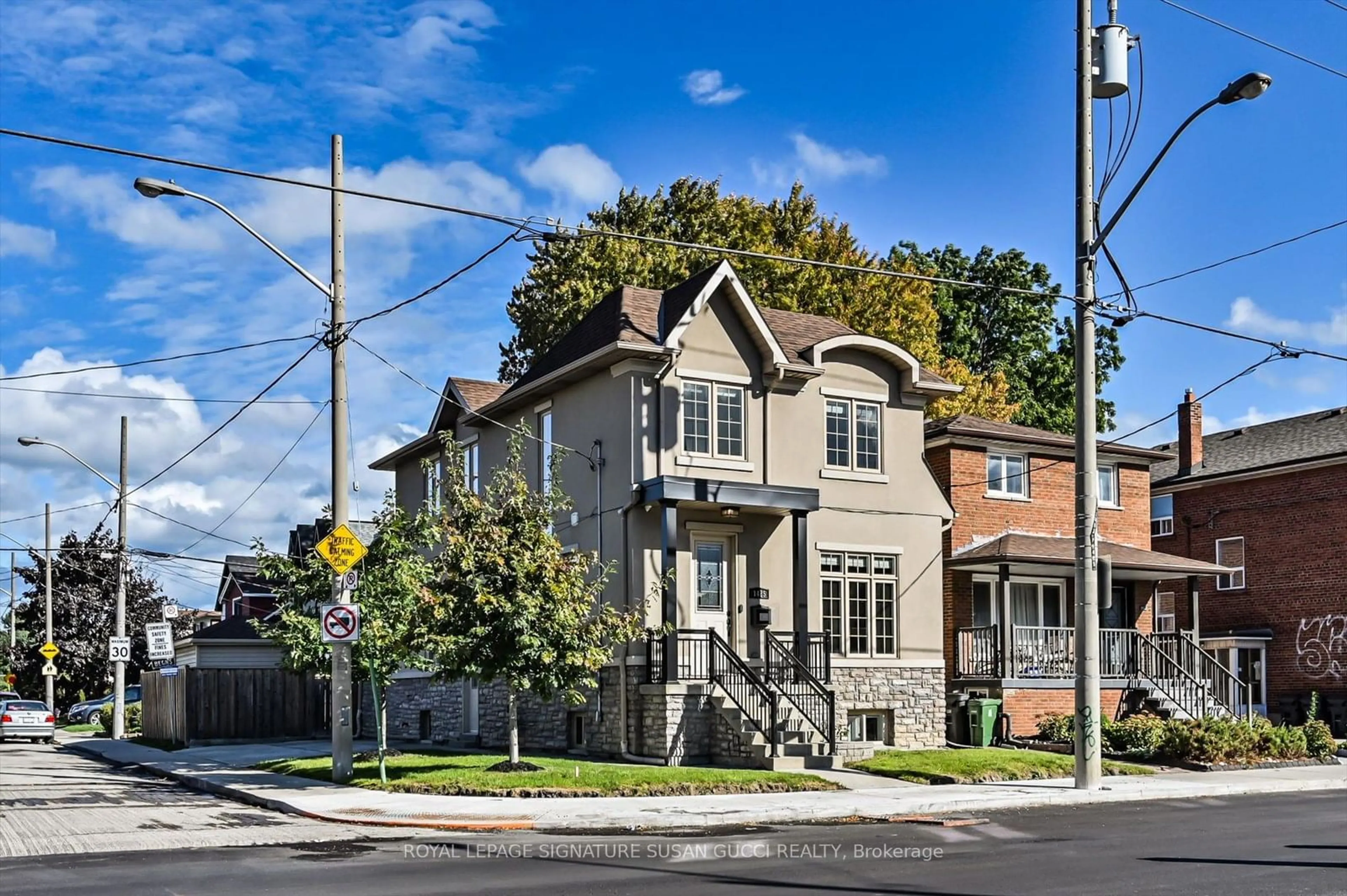 A pic from exterior of the house or condo, the street view for 1425 Woodbine Ave, Toronto Ontario M4C 4G7