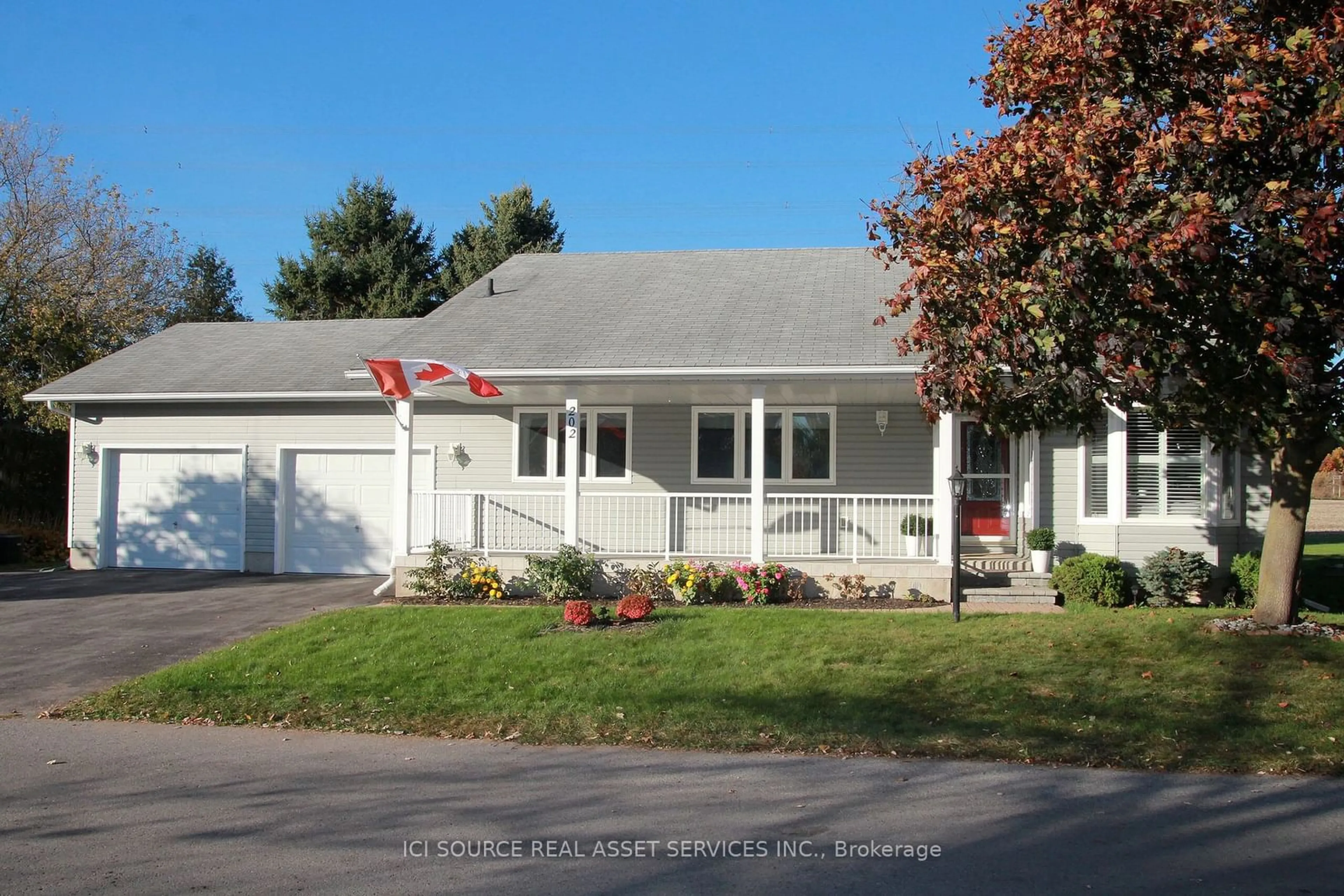 Frontside or backside of a home, the street view for 202 Wilmot Tr, Clarington Ontario L1B 1B2