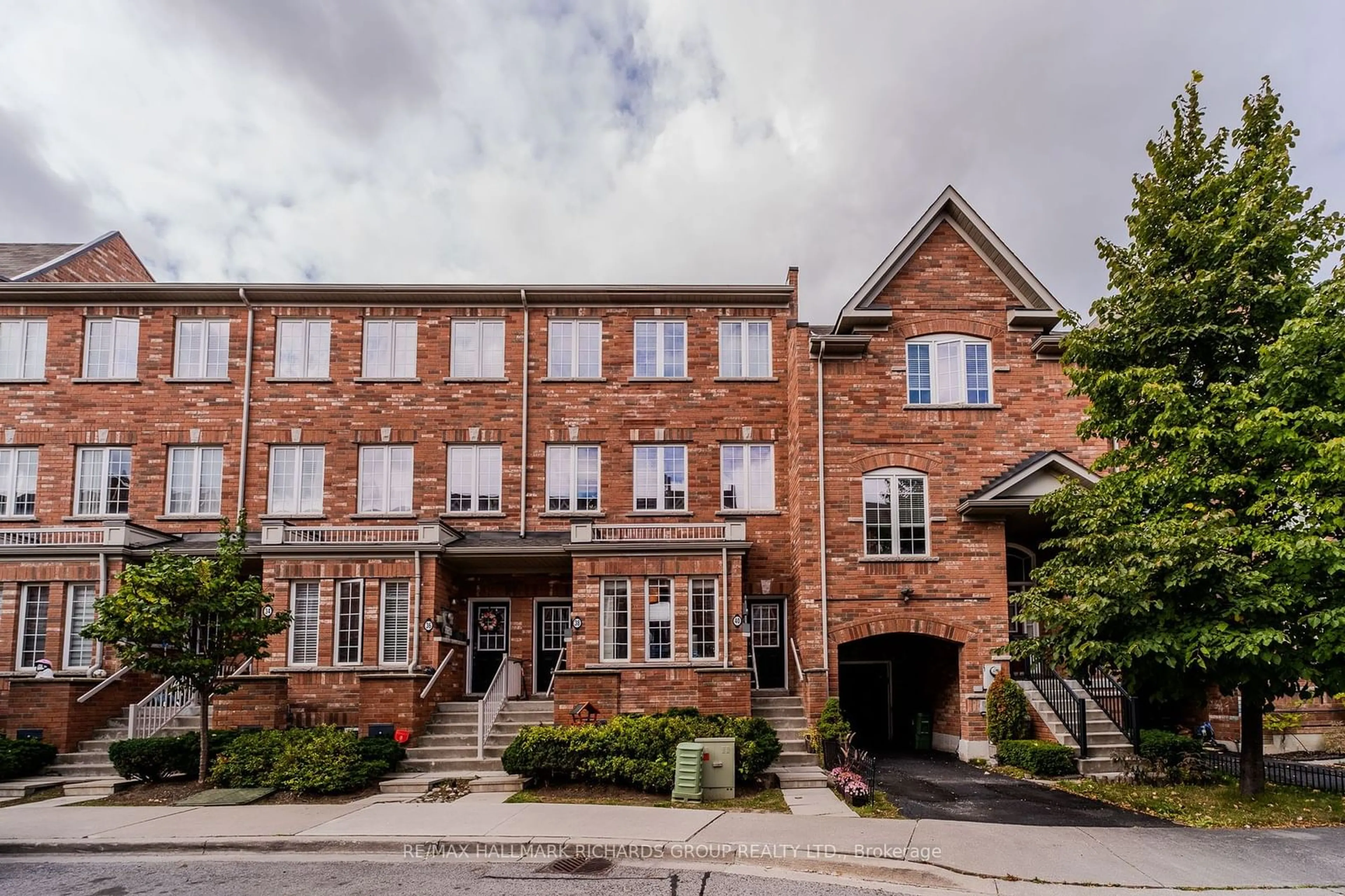 A pic from exterior of the house or condo, the front or back of building for 40 Carnahan Terr #40, Toronto Ontario M4E 0B2