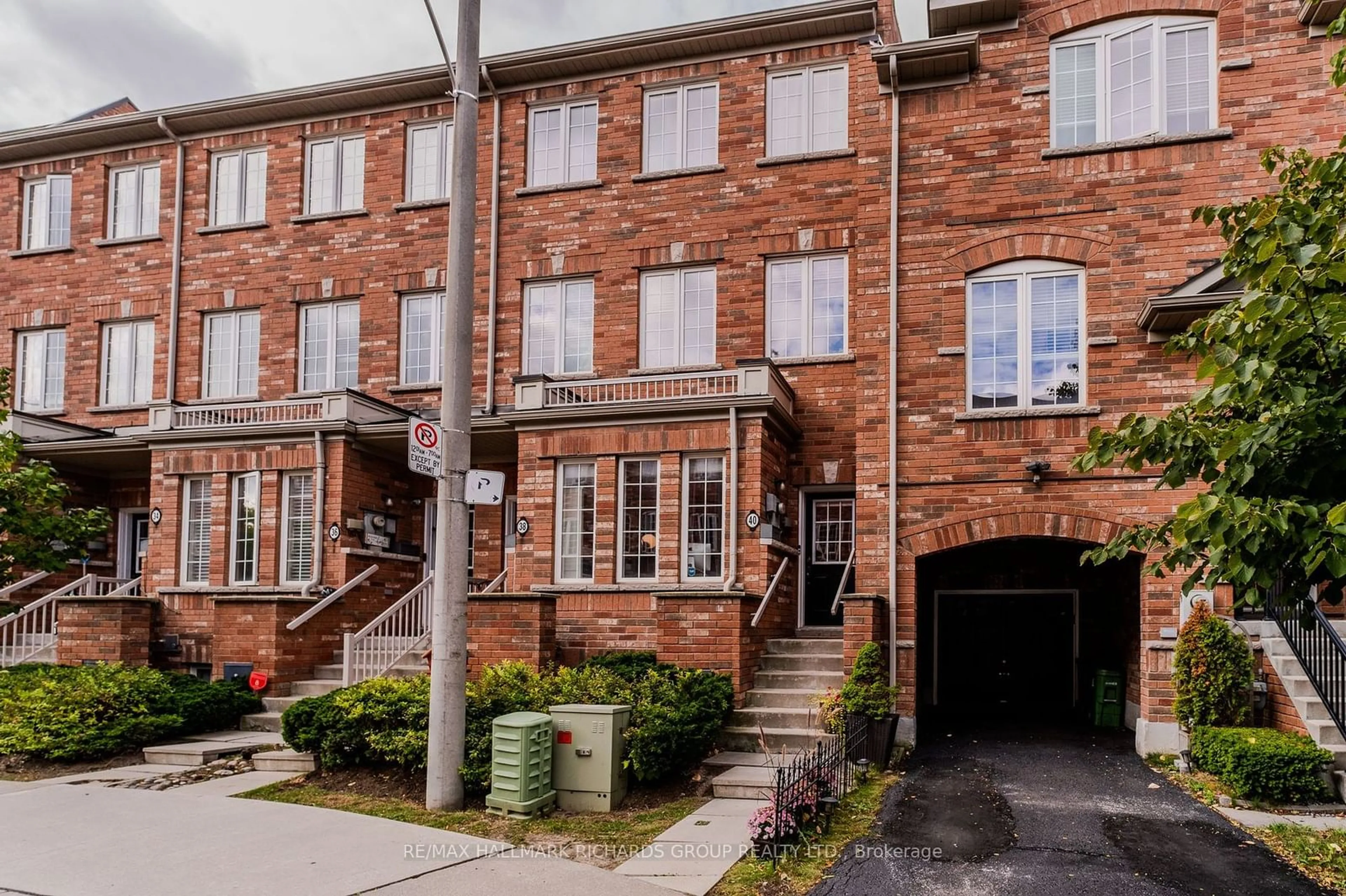 A pic from exterior of the house or condo, the street view for 40 Carnahan Terr #40, Toronto Ontario M4E 0B2