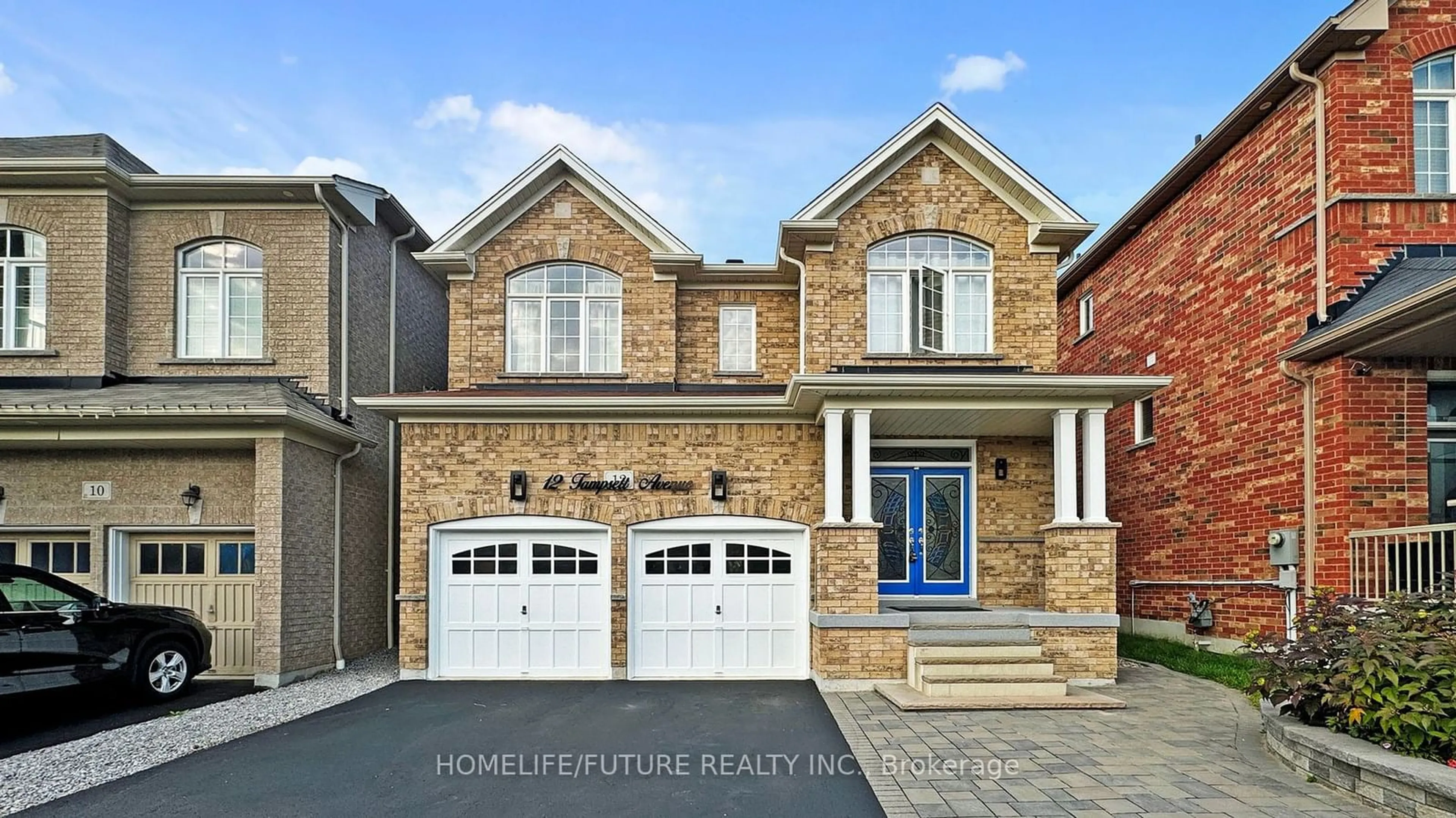 Home with brick exterior material for 12 Tampsett Ave, Ajax Ontario L1Z 0P9