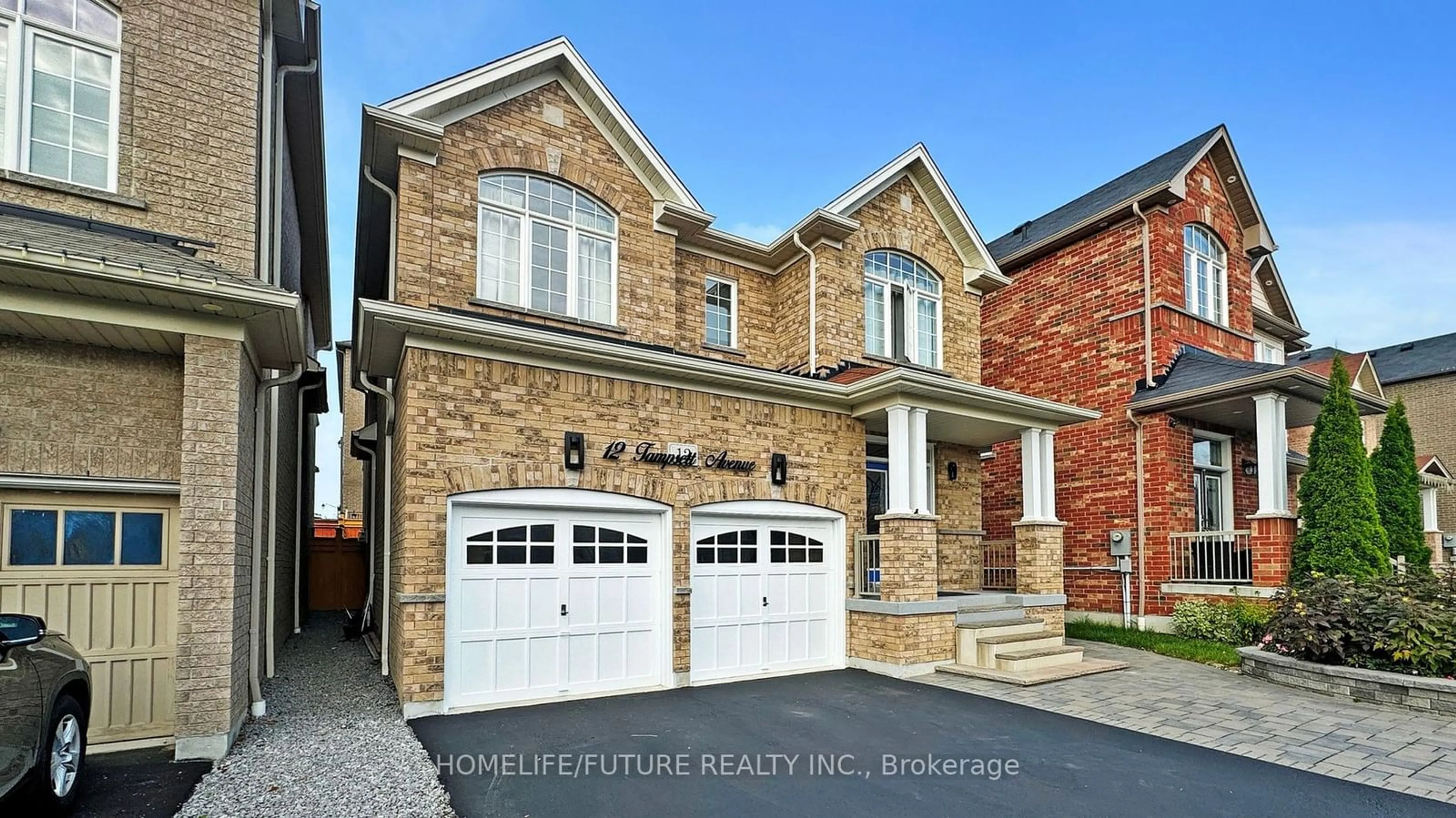 Home with brick exterior material for 12 Tampsett Ave, Ajax Ontario L1Z 0P9