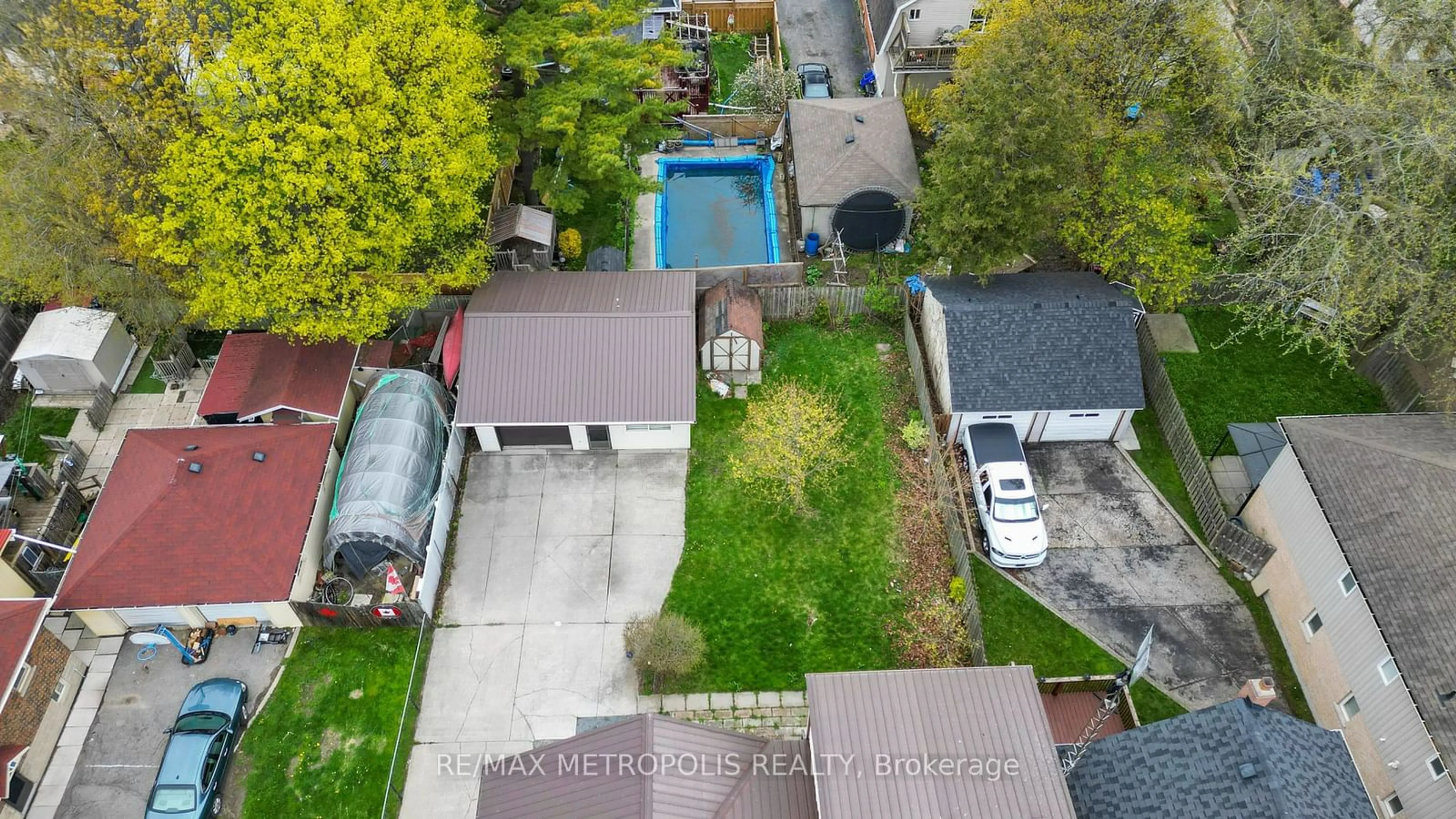 Frontside or backside of a home, the fenced backyard for 117 Montrave Ave, Oshawa Ontario L1J 4R6