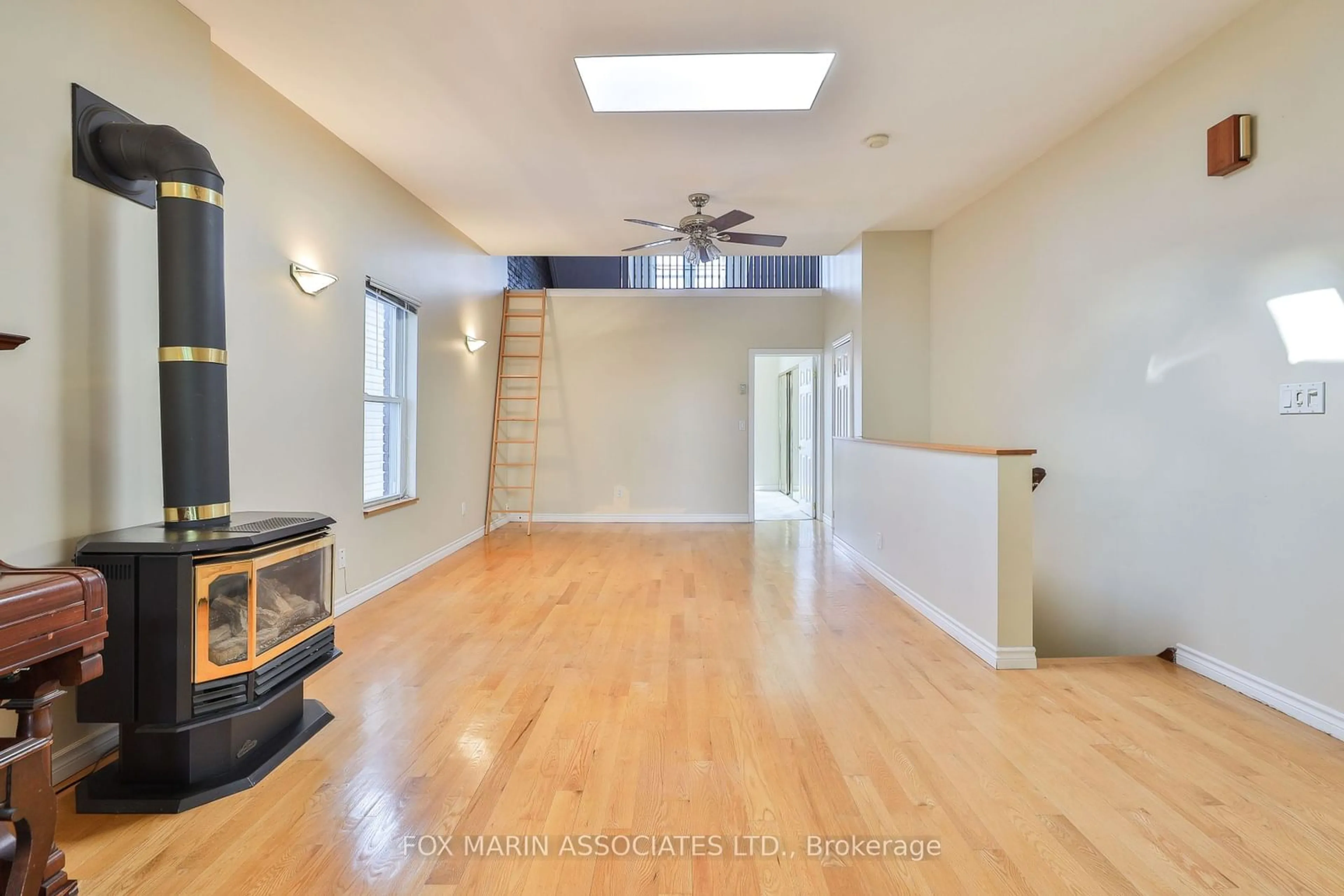 A pic of a room, wood floors for 335 Greenwood Ave, Toronto Ontario M4L 2R6