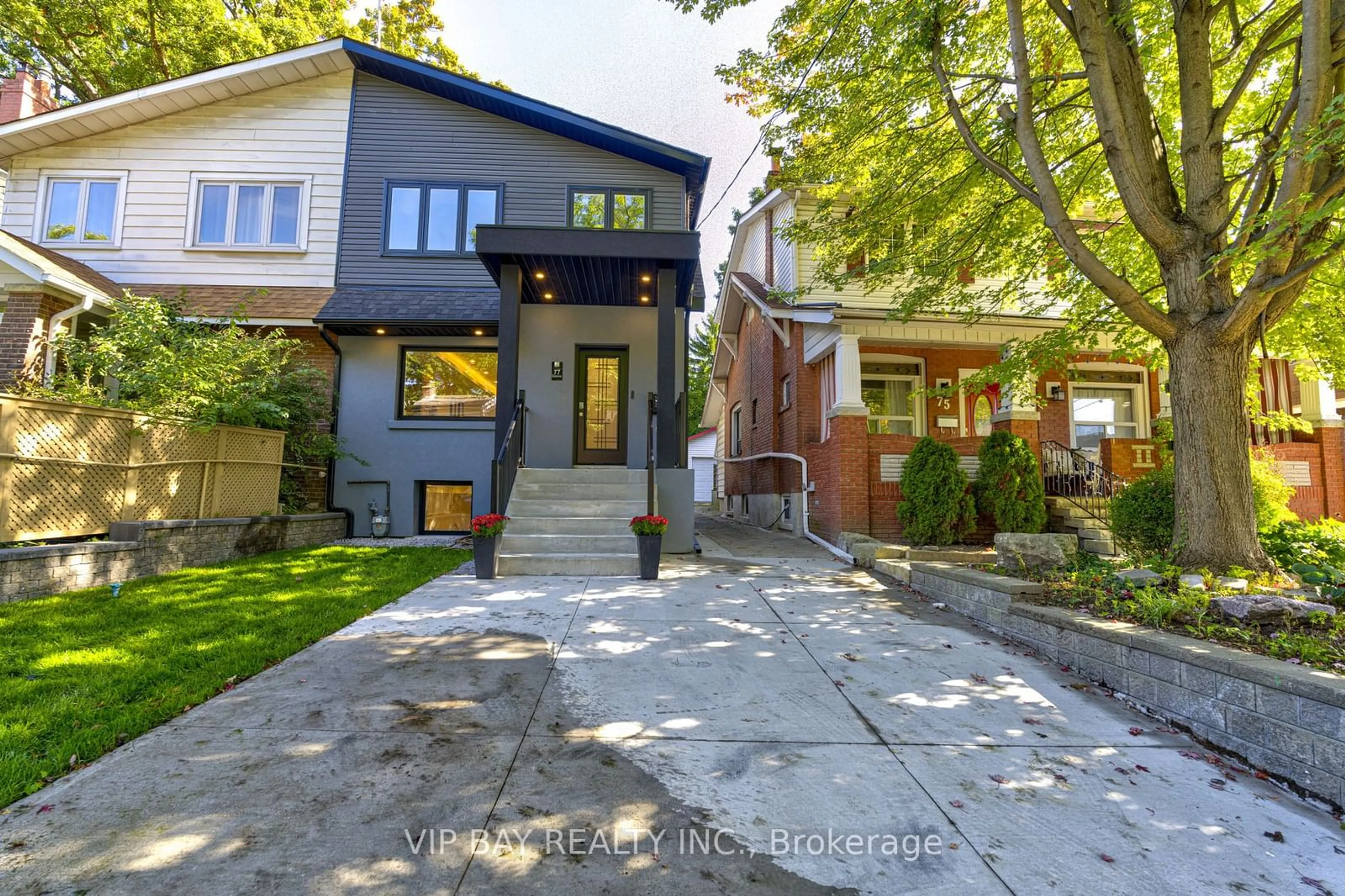 A pic from exterior of the house or condo, the street view for 77 Glenmore Rd, Toronto Ontario M4L 3M2