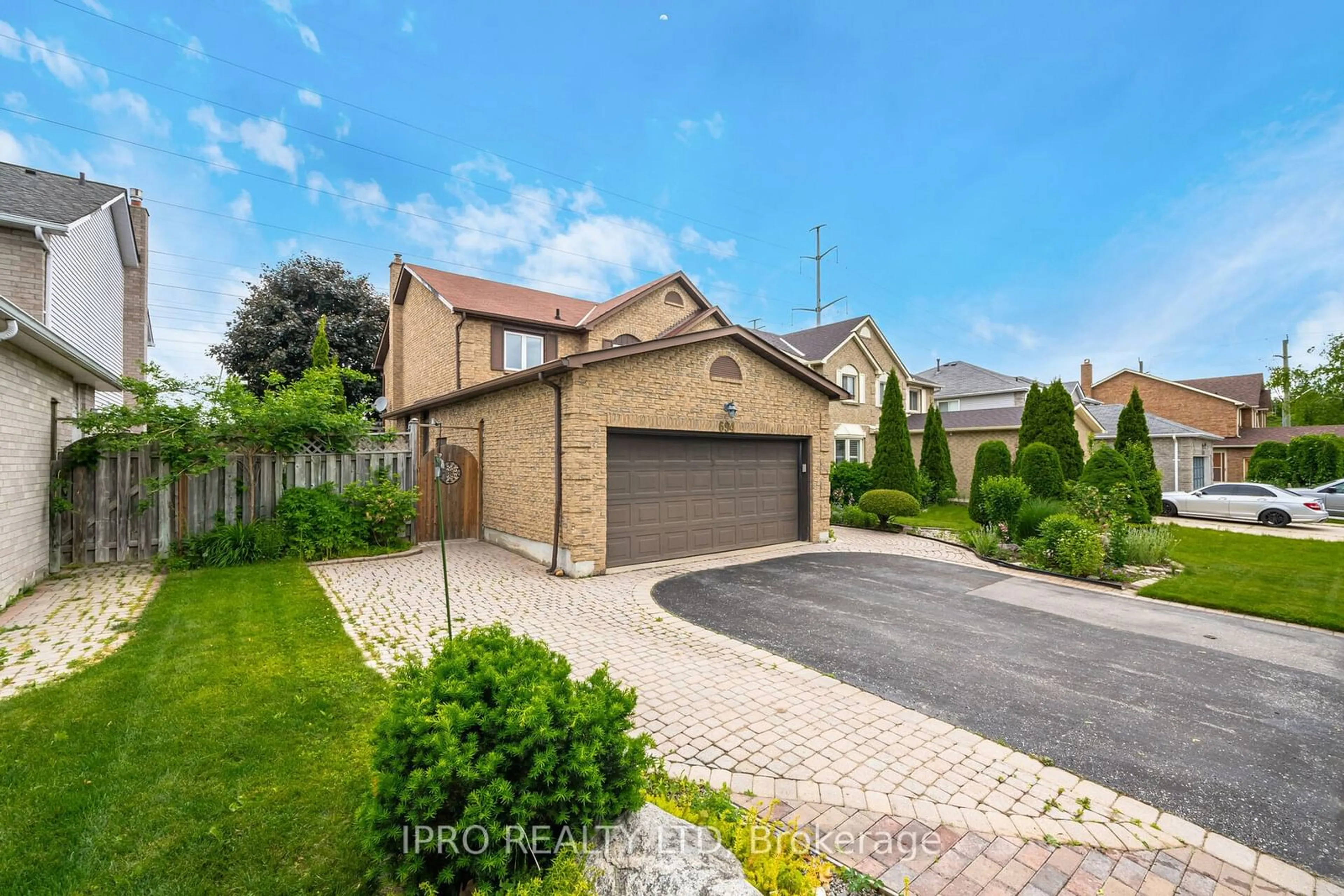 A pic from exterior of the house or condo, the fenced backyard for 694 Amaretto Ave, Pickering Ontario L1X 1L6