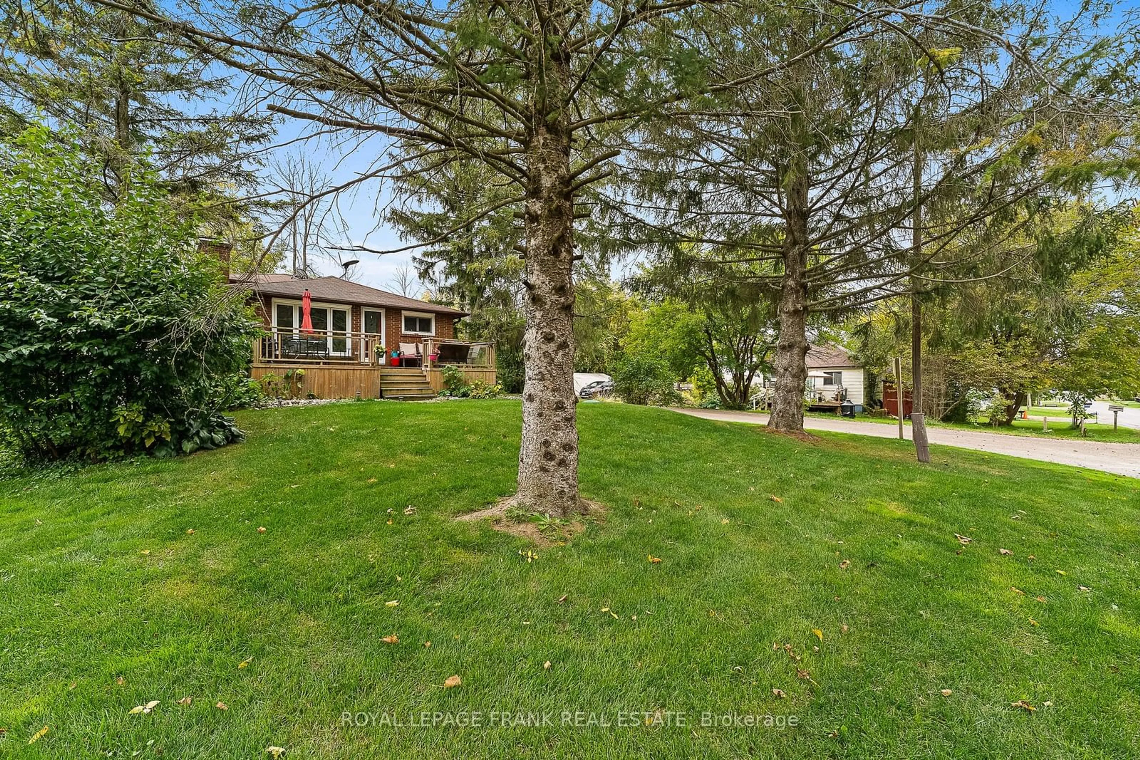 A pic from exterior of the house or condo, the fenced backyard for 19210 Scugog Point Rd, Scugog Ontario L0B 1E0