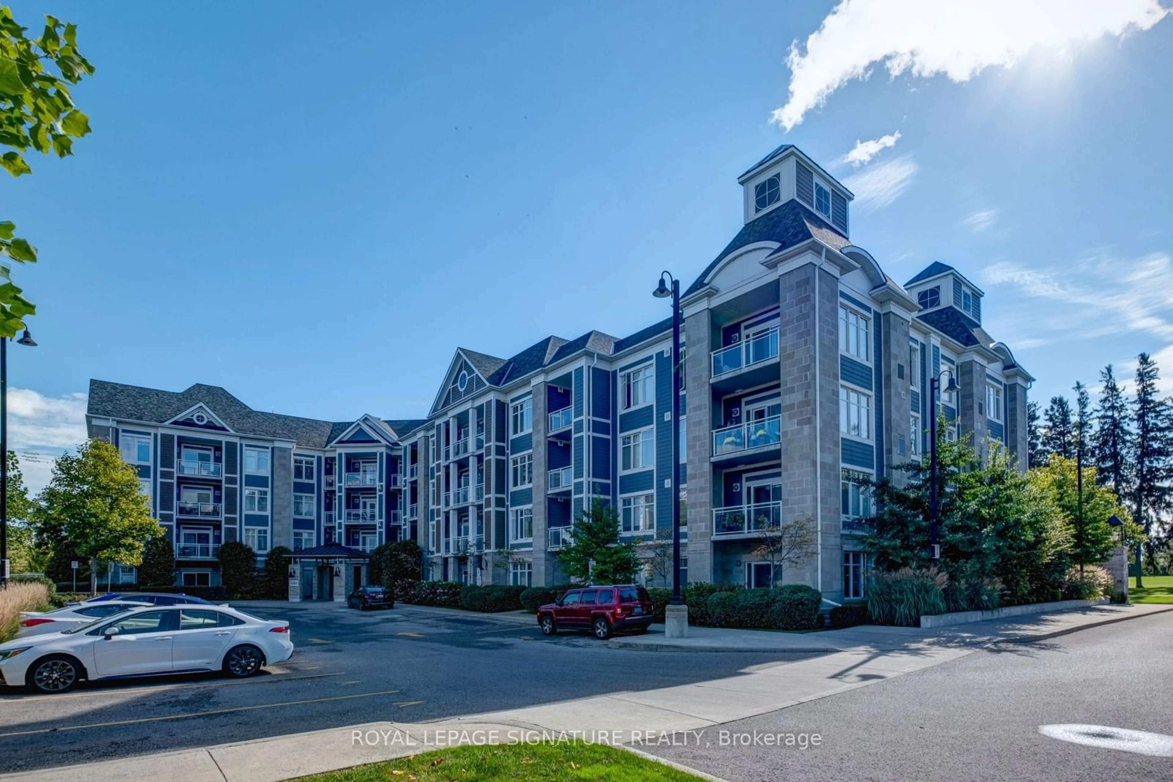 A pic from exterior of the house or condo, the front or back of building for 680 Gordon St #301, Whitby Ontario L1N 0L2