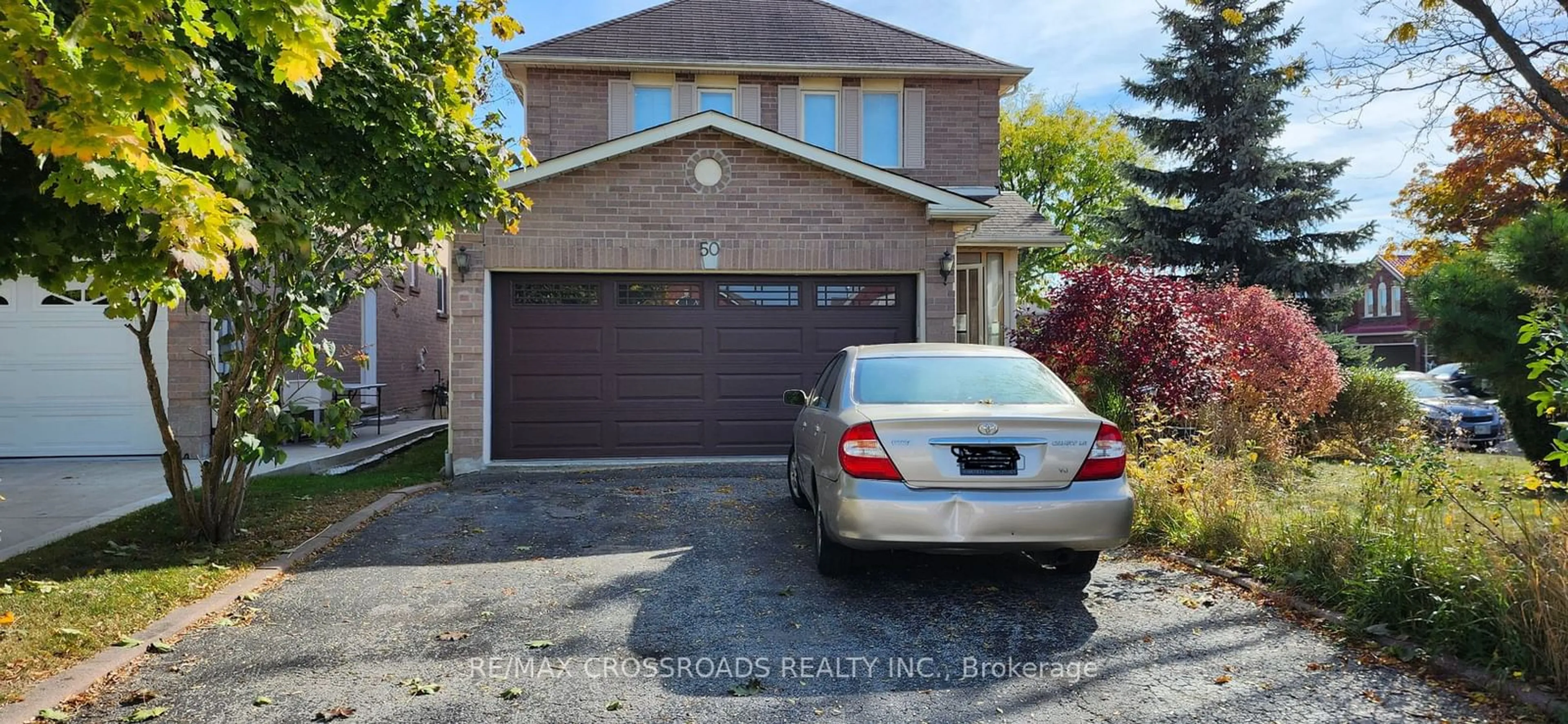 Frontside or backside of a home, the street view for 50 McInnes Cres, Toronto Ontario M1B 5E8