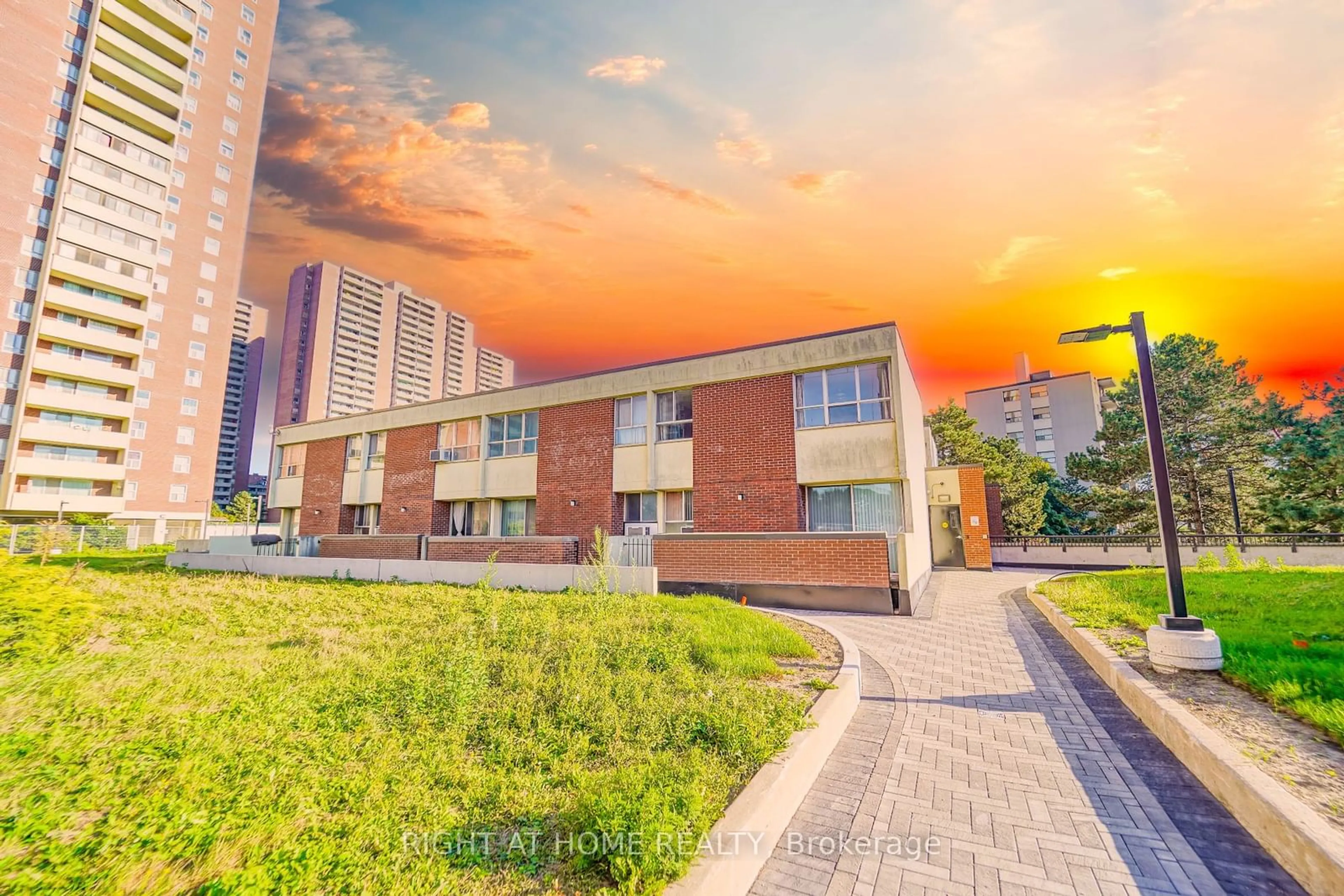 A pic from exterior of the house or condo, the street view for 10 Crescent Town Rd #303, Toronto Ontario M4C 5L3