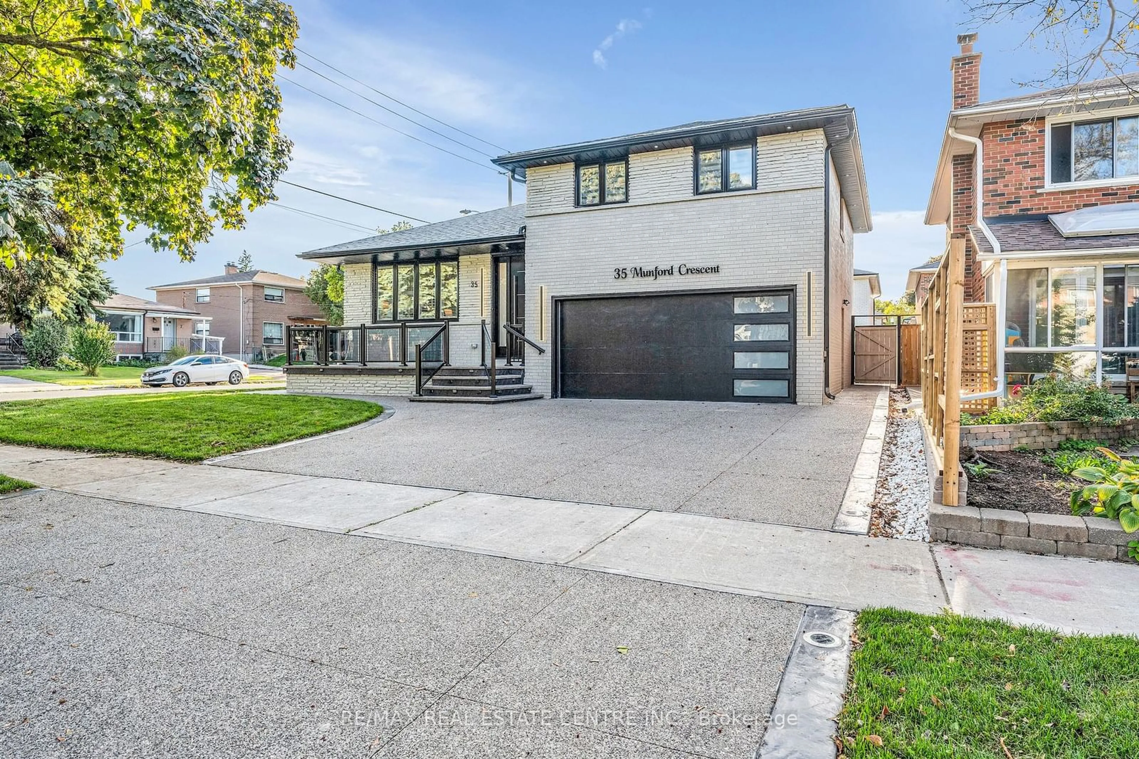 Frontside or backside of a home, the street view for 35 Munford Cres, Toronto Ontario M4B 1B9